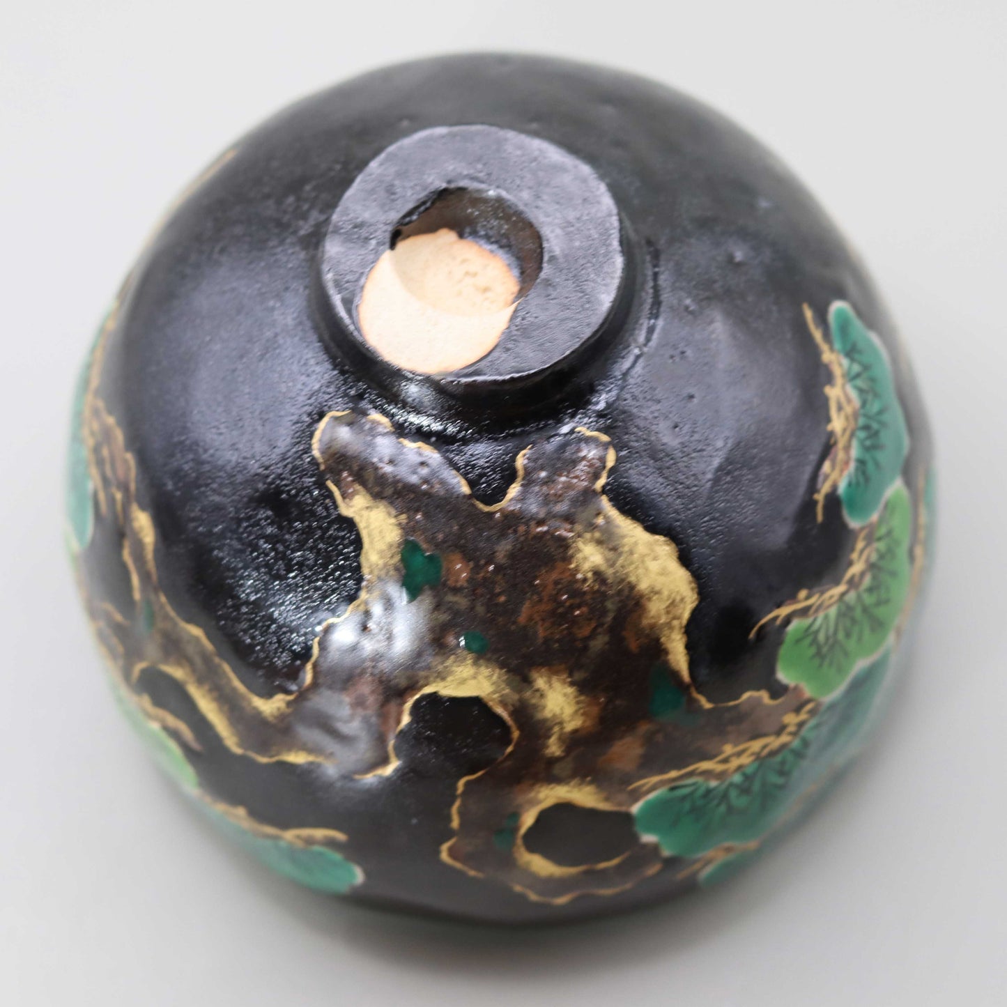 Raku tea bowl with pine by Kosai Miyagawa