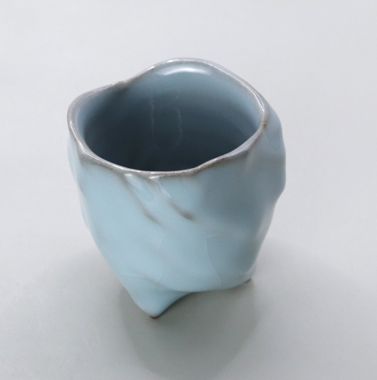 Celadon sake cup by Masao Tagai