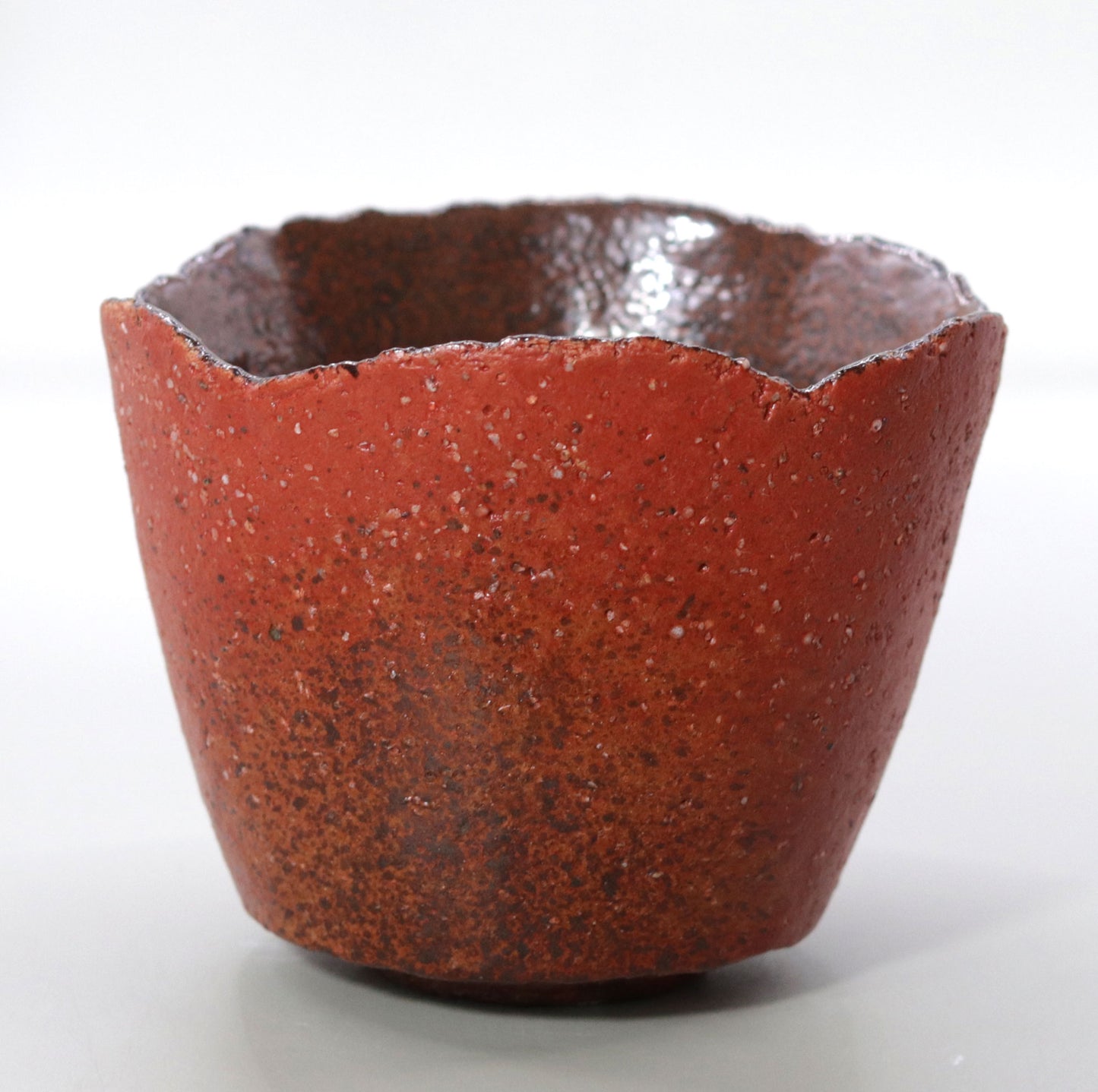 Powerful presence Red Concave Tea Bowl by Nishihata Tadashi