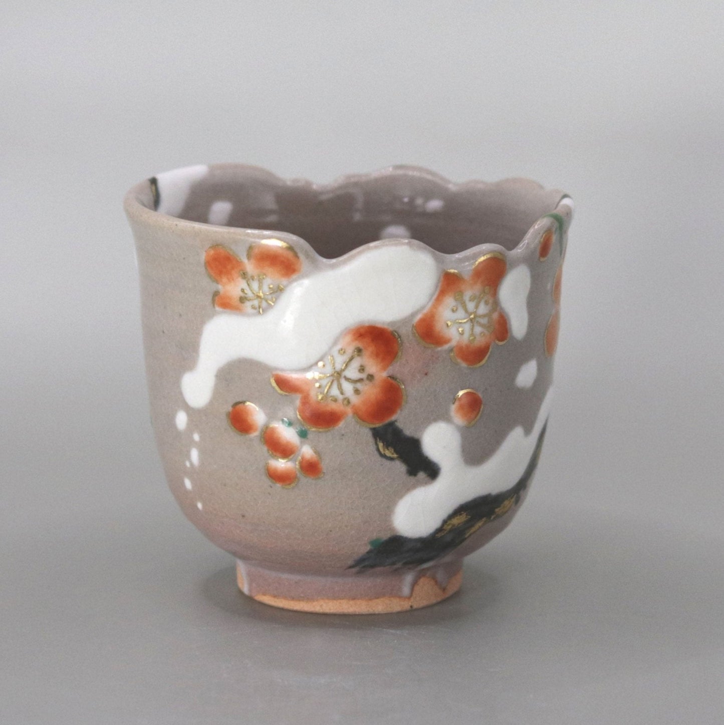 Kenzan's Snow-covered Plum Blossom Sake Cup by Kosai Miyagawa