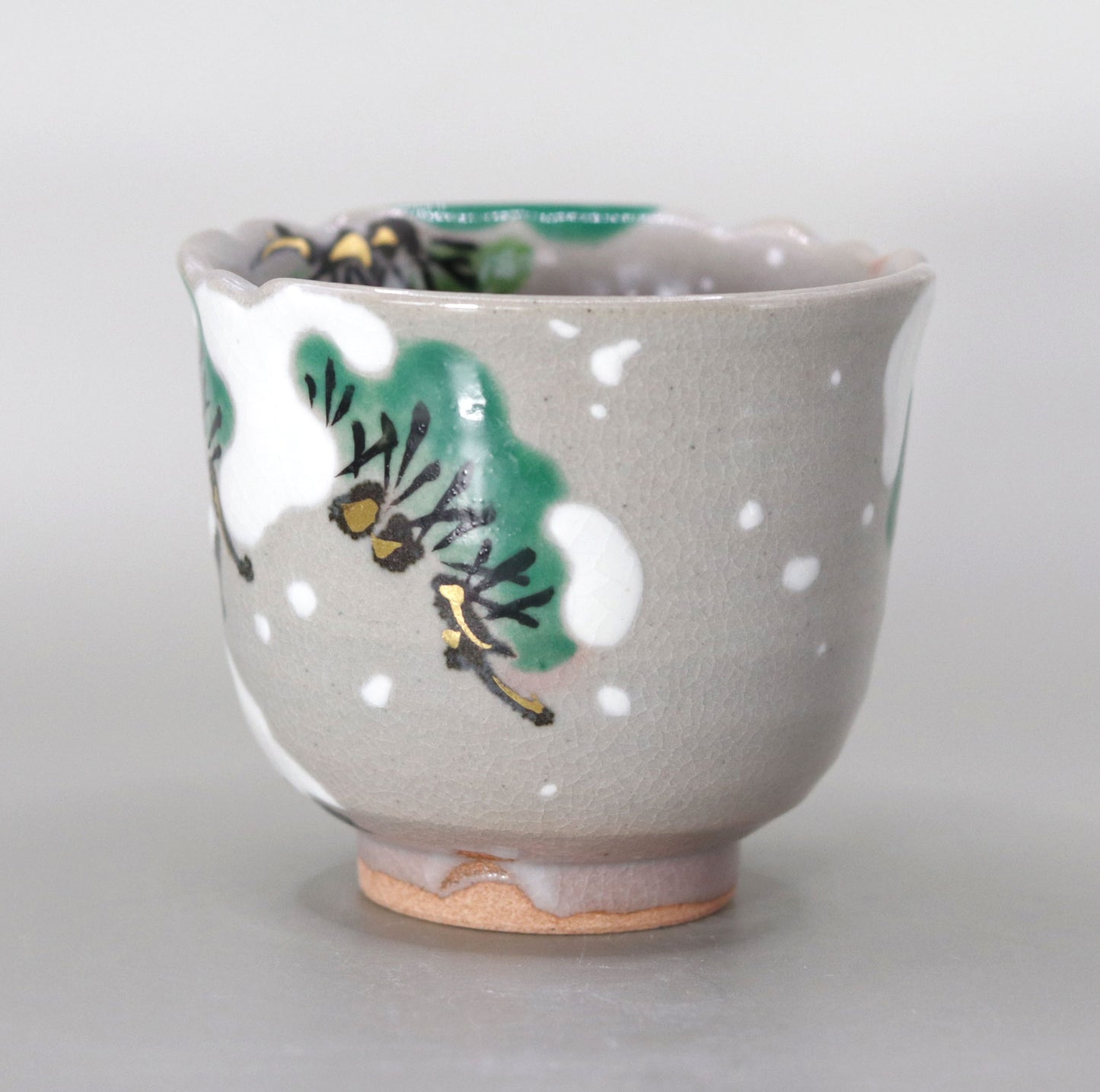 Kenzan's Snow and Pine Tree Sake Cup by Miyagawa Kosai