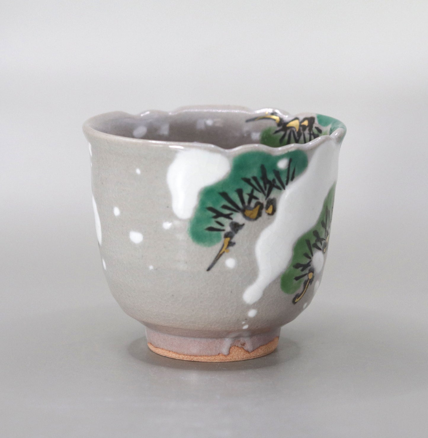 Kenzan's Snow and Pine Tree Sake Cup by Miyagawa Kosai