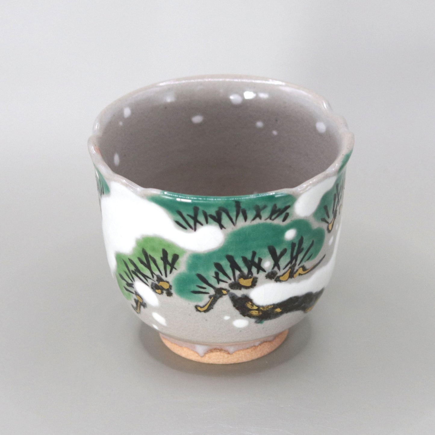 Kenzan's Snow and Pine Tree Sake Cup by Miyagawa Kosai