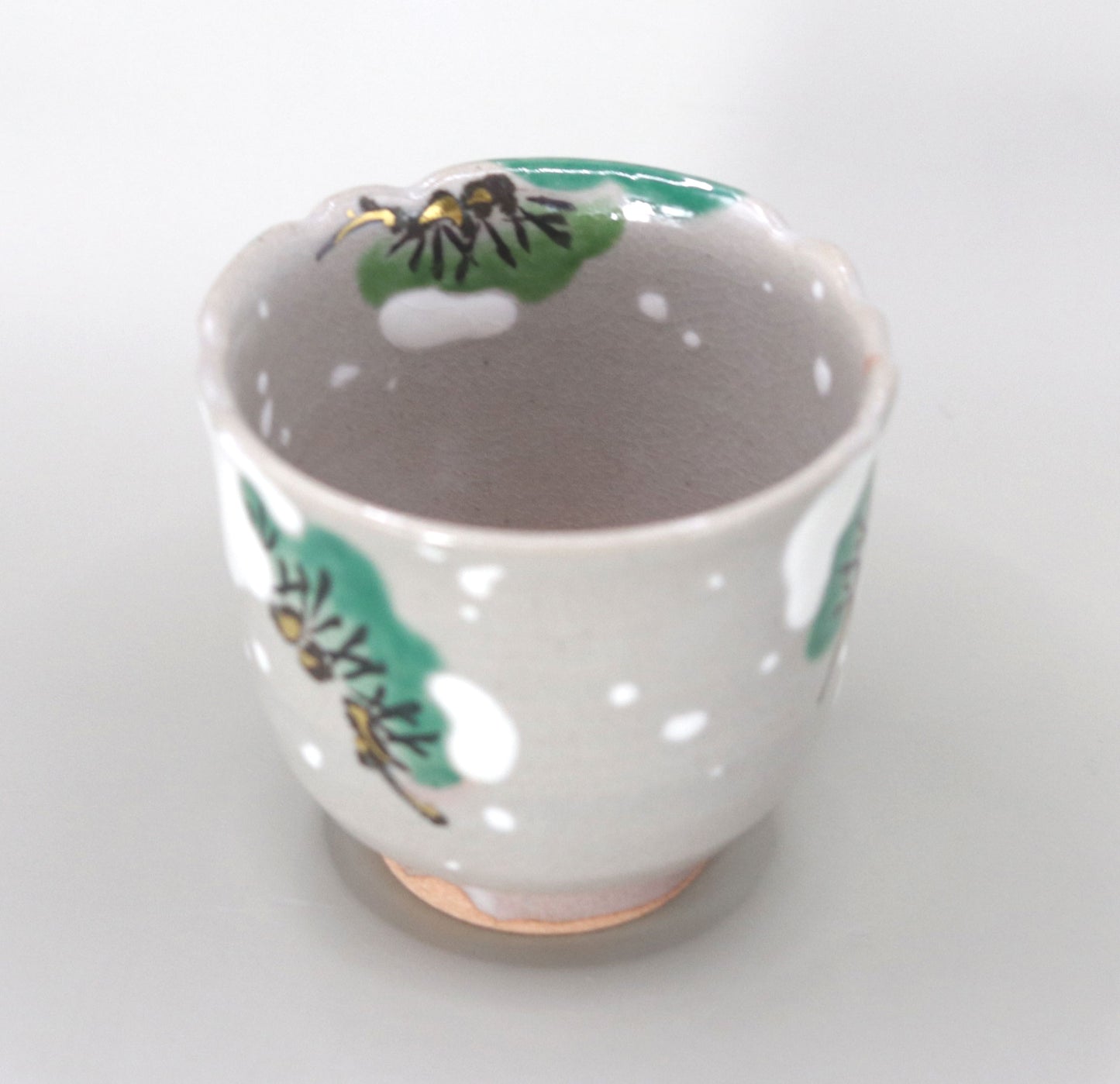 Kenzan's Snow and Pine Tree Sake Cup by Miyagawa Kosai