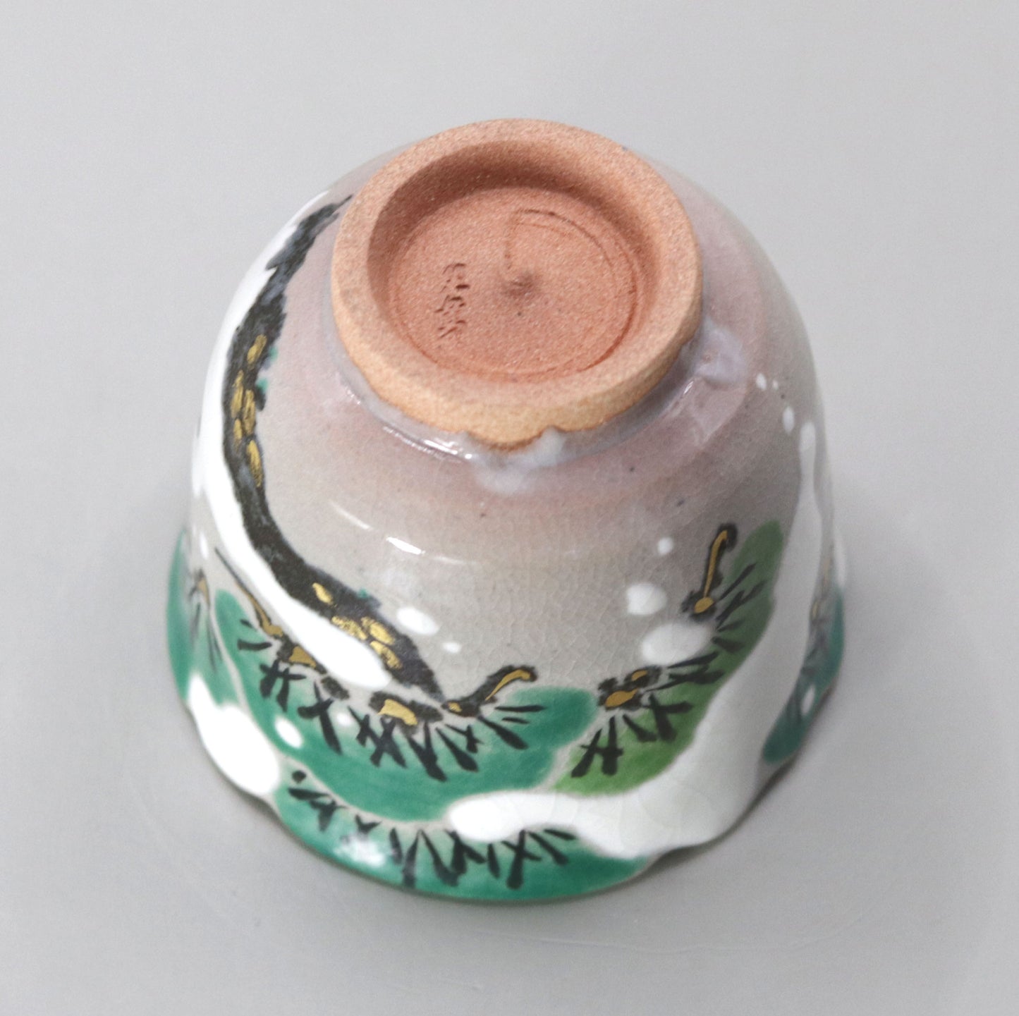 Kenzan's Snow and Pine Tree Sake Cup by Miyagawa Kosai