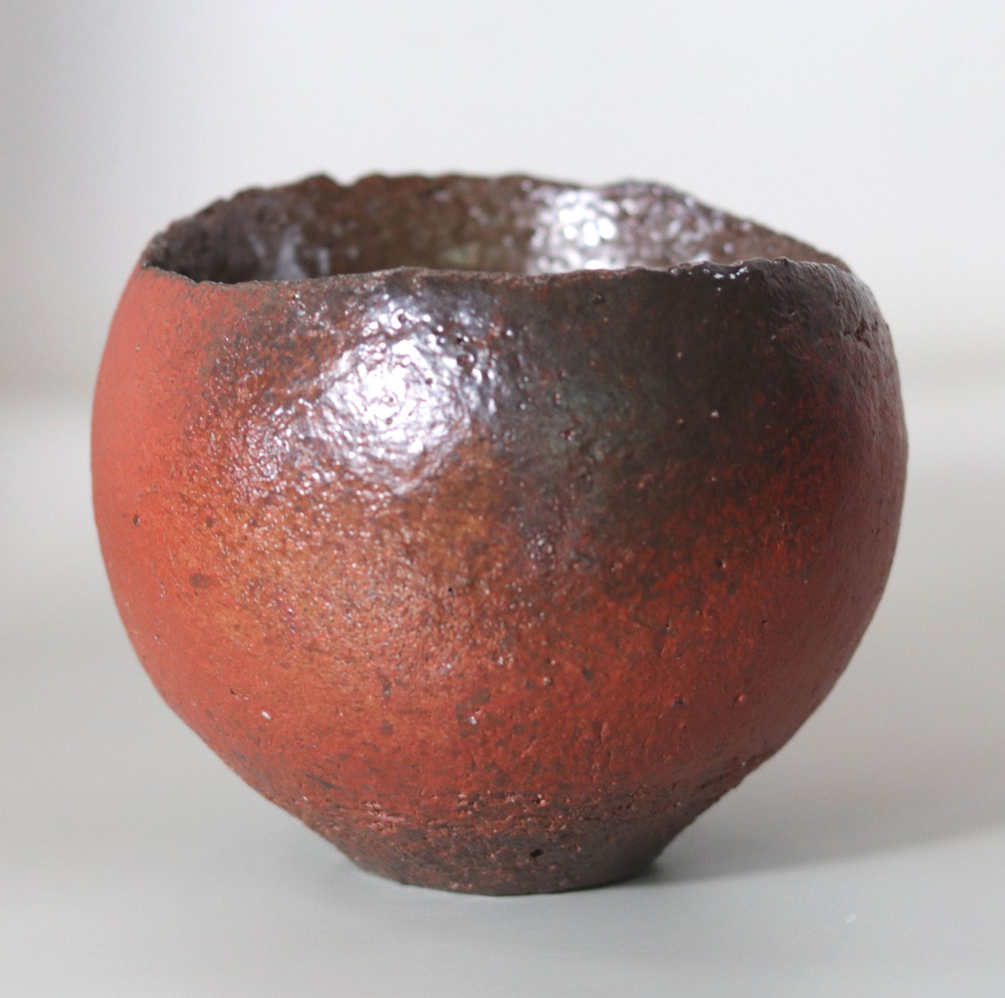 Tanba Red Concave Tea Bowl by Nishihata Tadashi