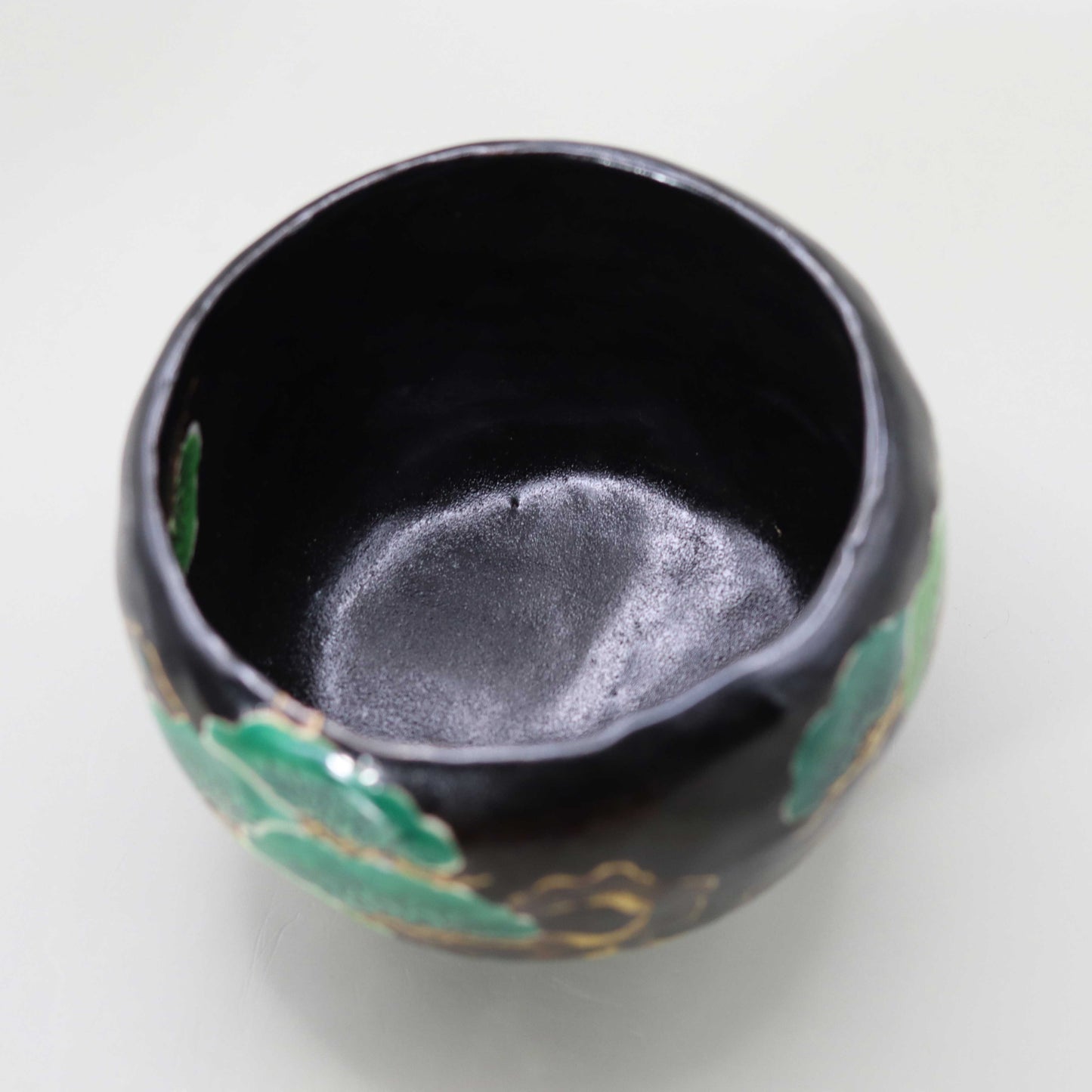 12 Black glaze hand-formed pine tree tea bowl by Kosai Miyagawa