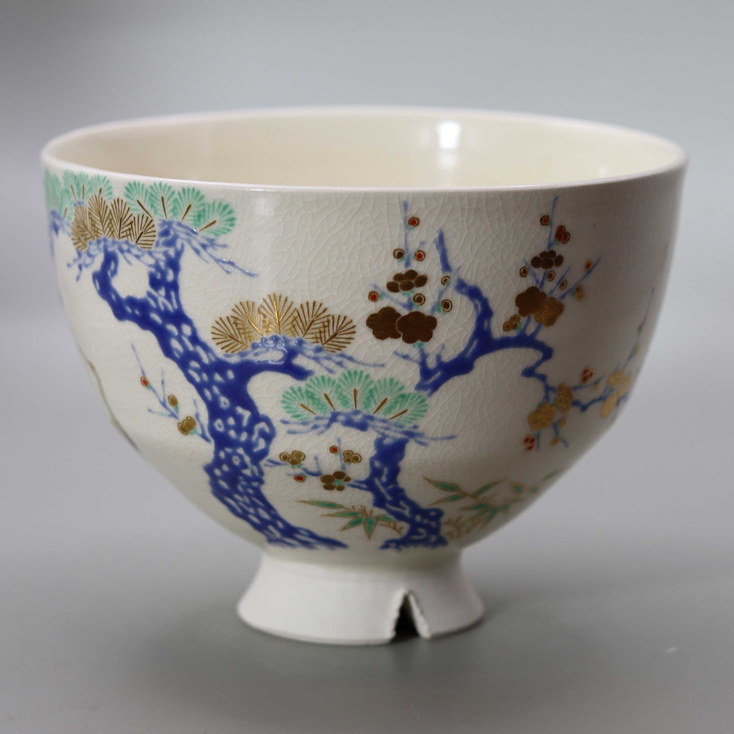 16 Tea bowl with a design of pine, bamboo, plum and crane, copied from Ninsei by Miyagawa Kosai