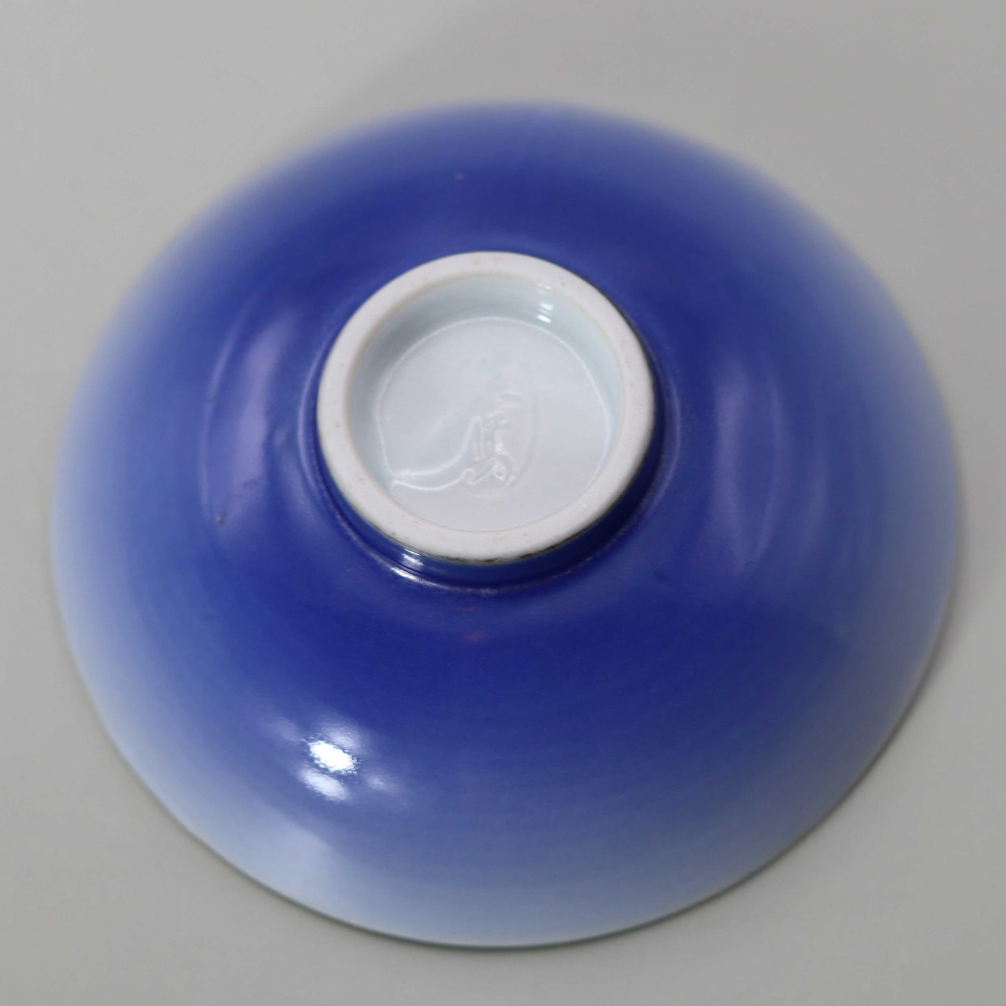 Blue and white Kochi Wave Back Flat Sake Cup by Miyagawa Kosai