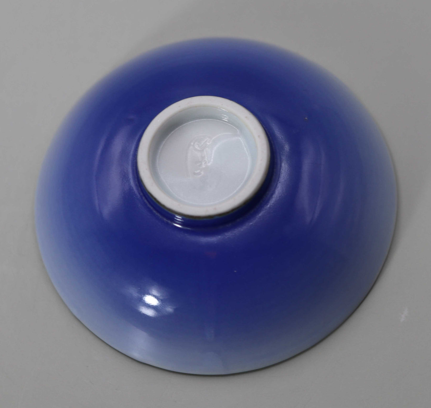 Blue and white Kochi Wave Back Flat Sake Cup by Miyagawa Kosai