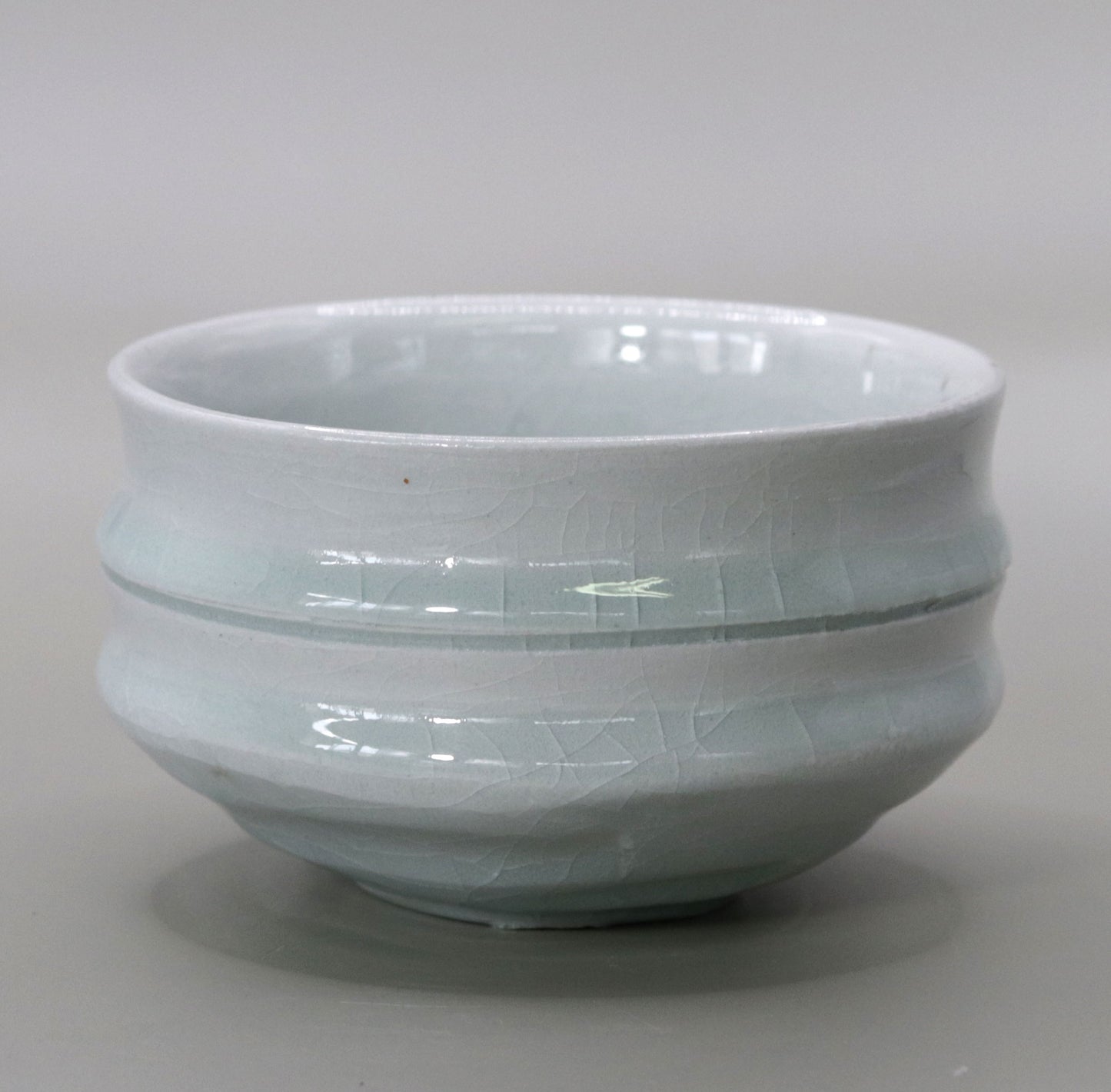 Ash-glazed bamboo tea bowl by Rakusai Onishi