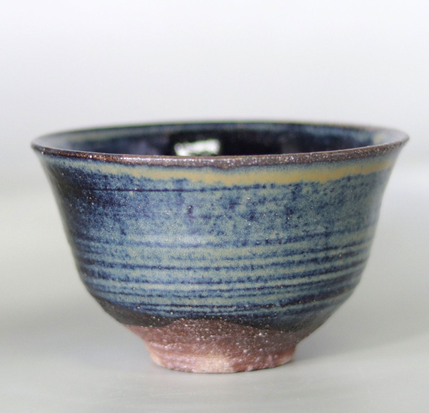 Iron-glazed tea bowl made from the base of the East Pagoda of Yakushiji Temple by Rakusai Bisai