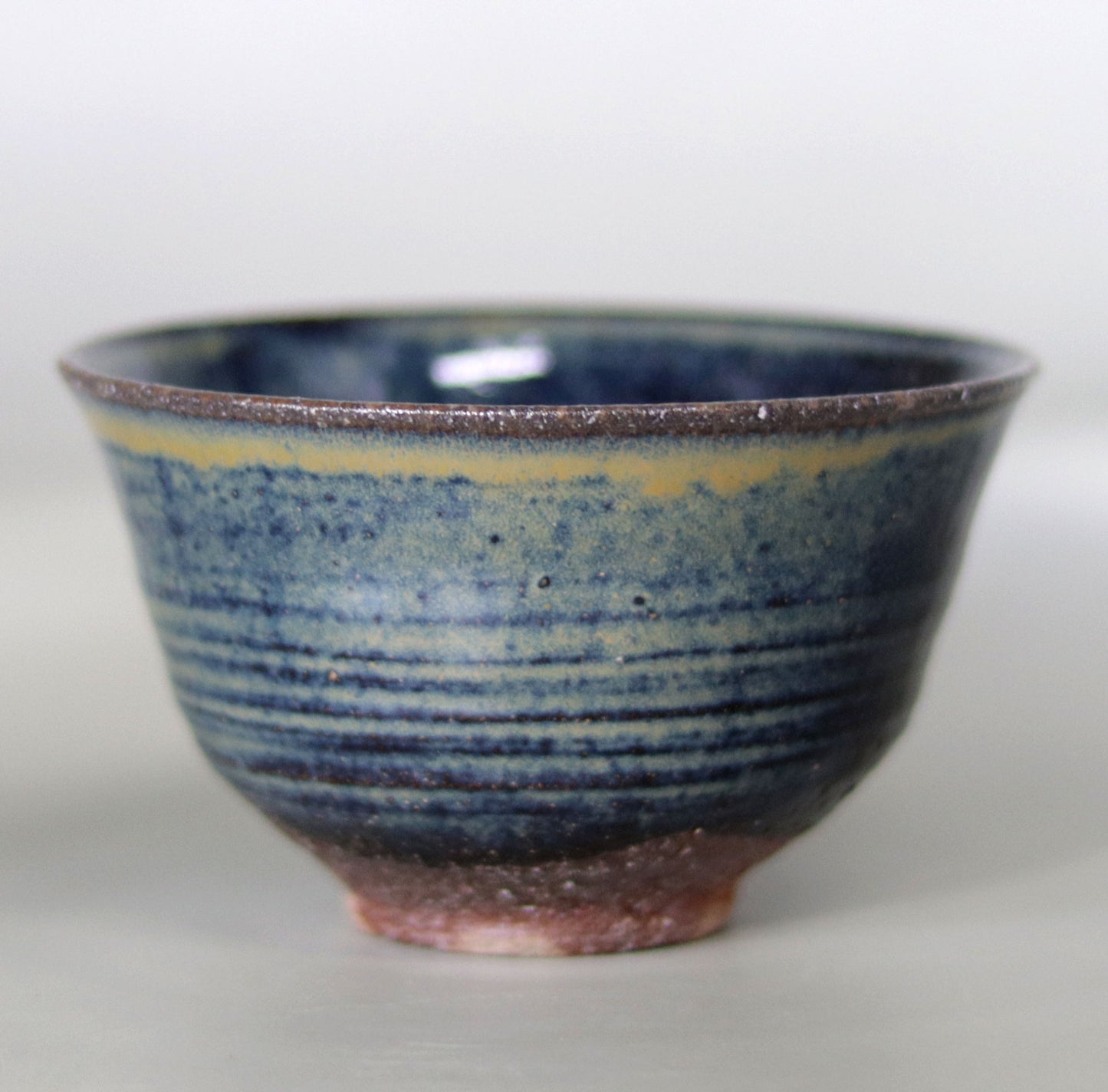 Iron-glazed tea bowl made from the base of the East Pagoda of Yakushiji Temple by Rakusai Bisai