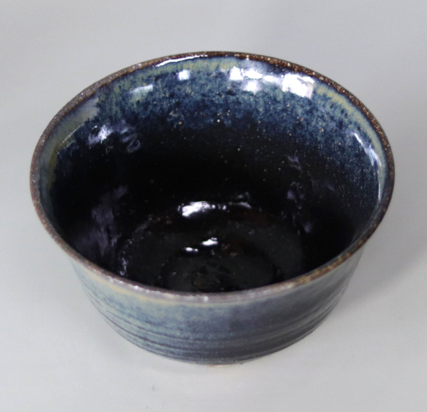 Iron-glazed tea bowl made from the base of the East Pagoda of Yakushiji Temple by Rakusai Bisai