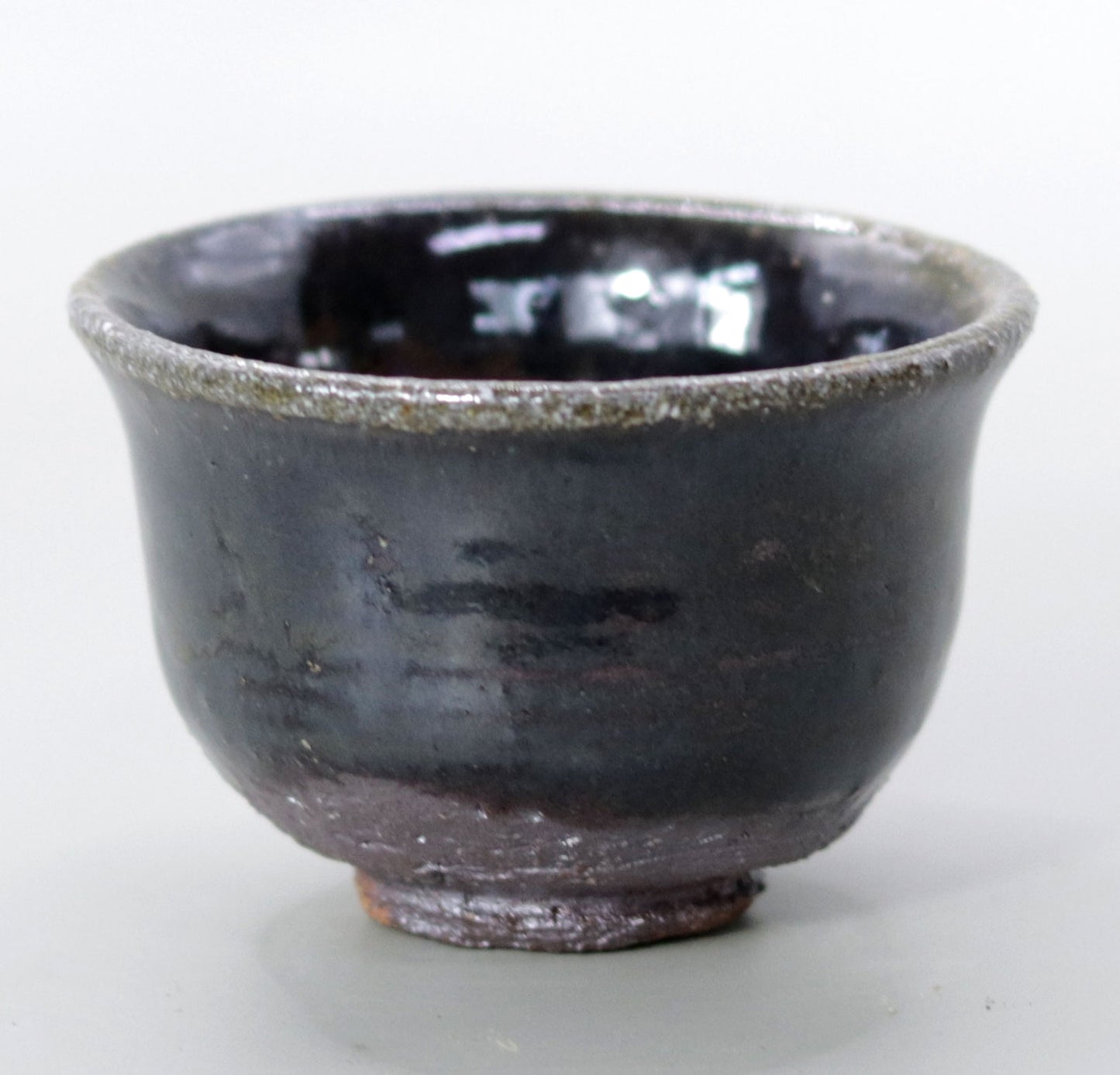 Iron glazed sake cup made from the foundation of the East Pagoda of Yakushiji Temple by Rakusai Bisai