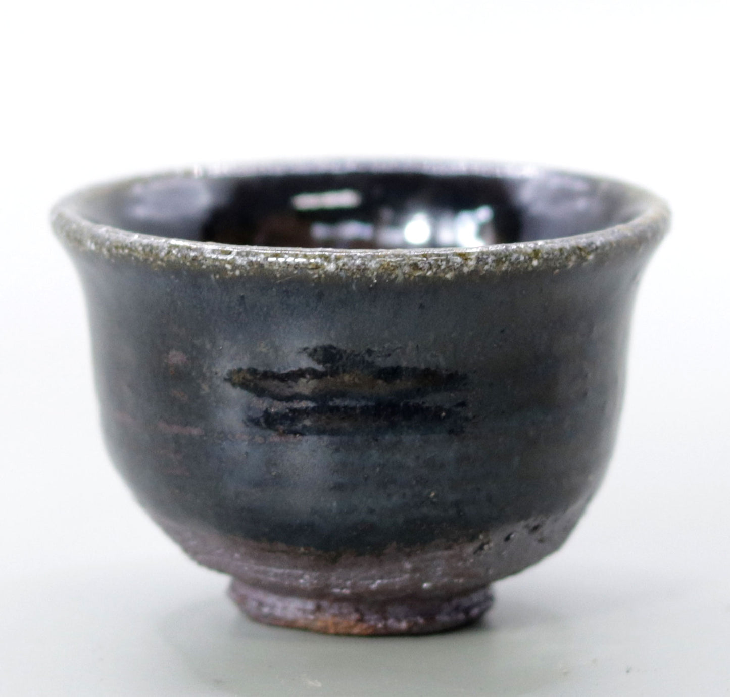 Iron glazed sake cup made from the foundation of the East Pagoda of Yakushiji Temple by Rakusai Bisai