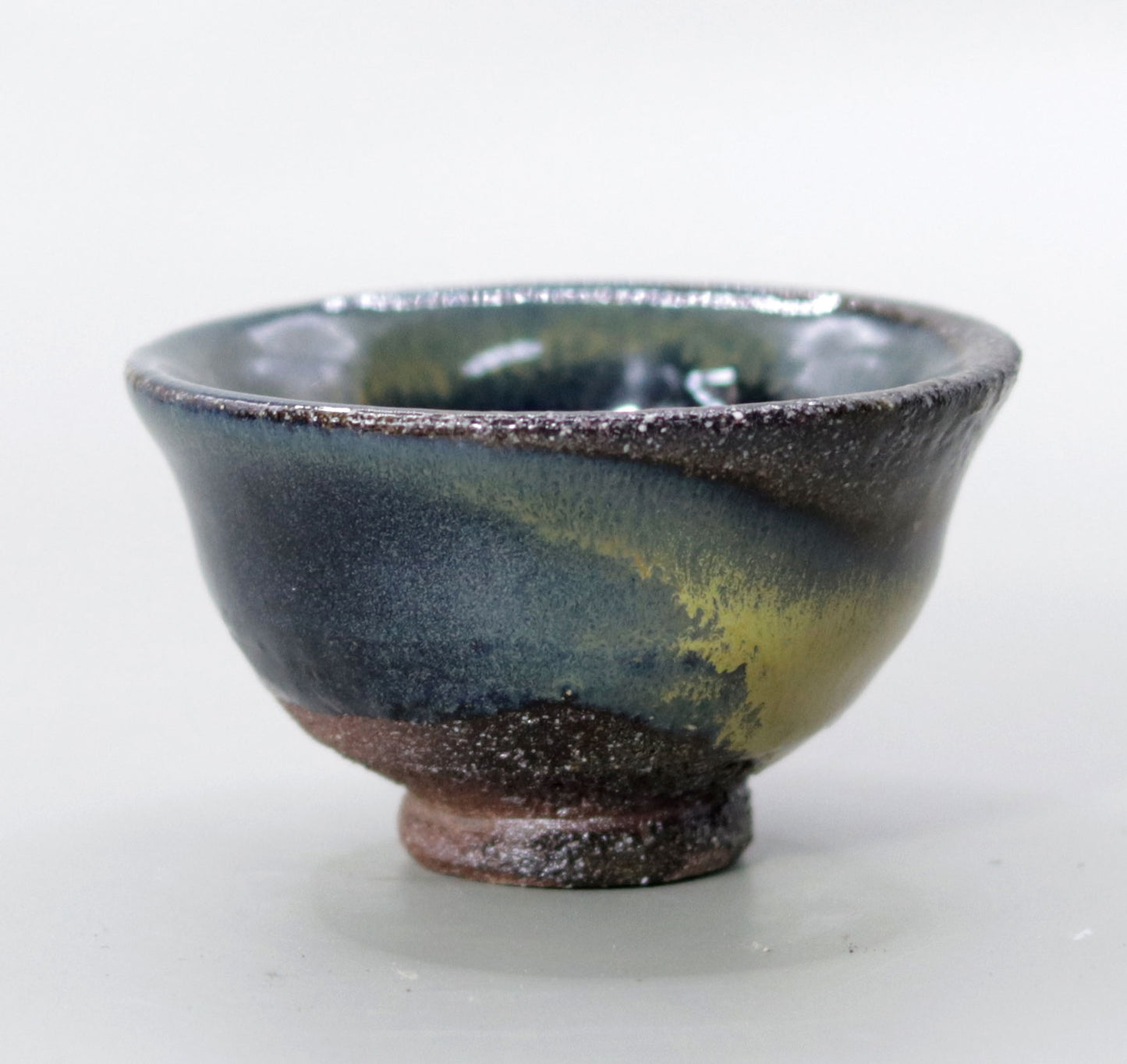 Iron glazed sake cup made from the foundation of the East Pagoda of Yakushiji Temple by Rakusai Bisai