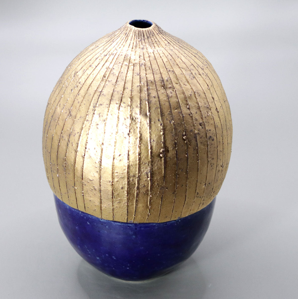 Blue and gold vase by Yasushi Fujihira