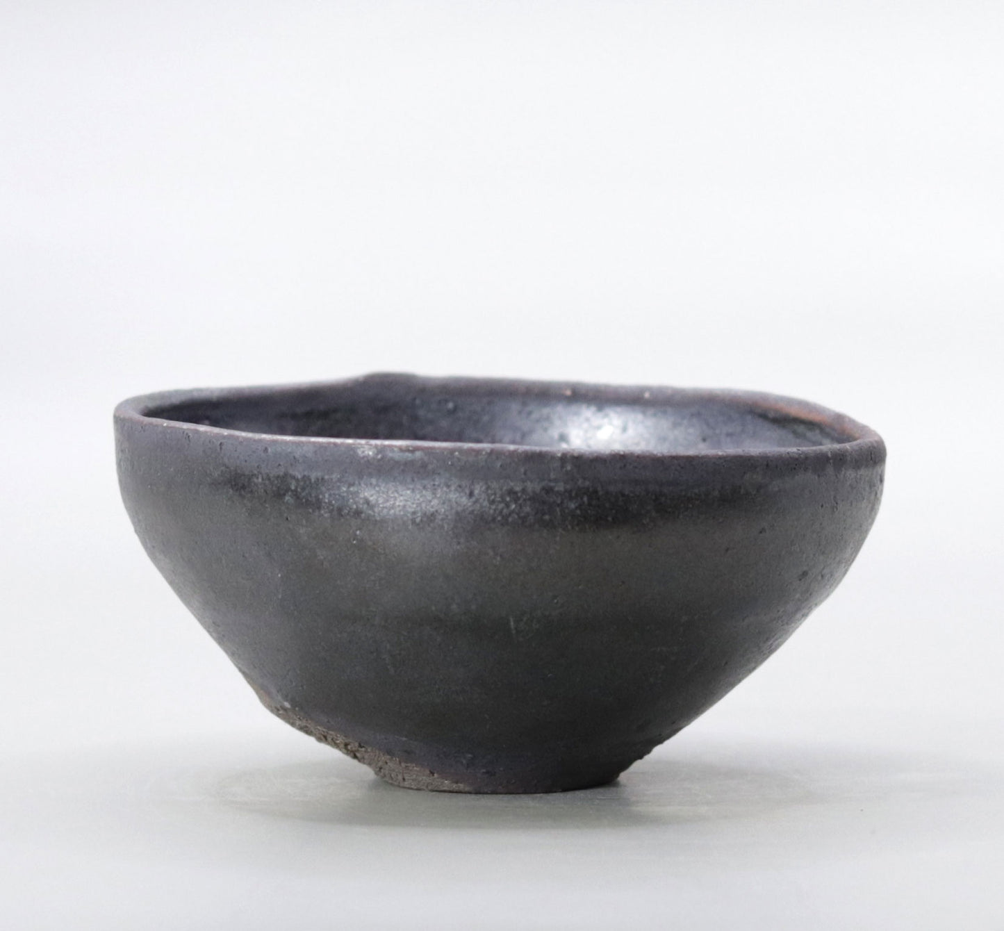 Iron glazed sake cup by Yuichi Ikai