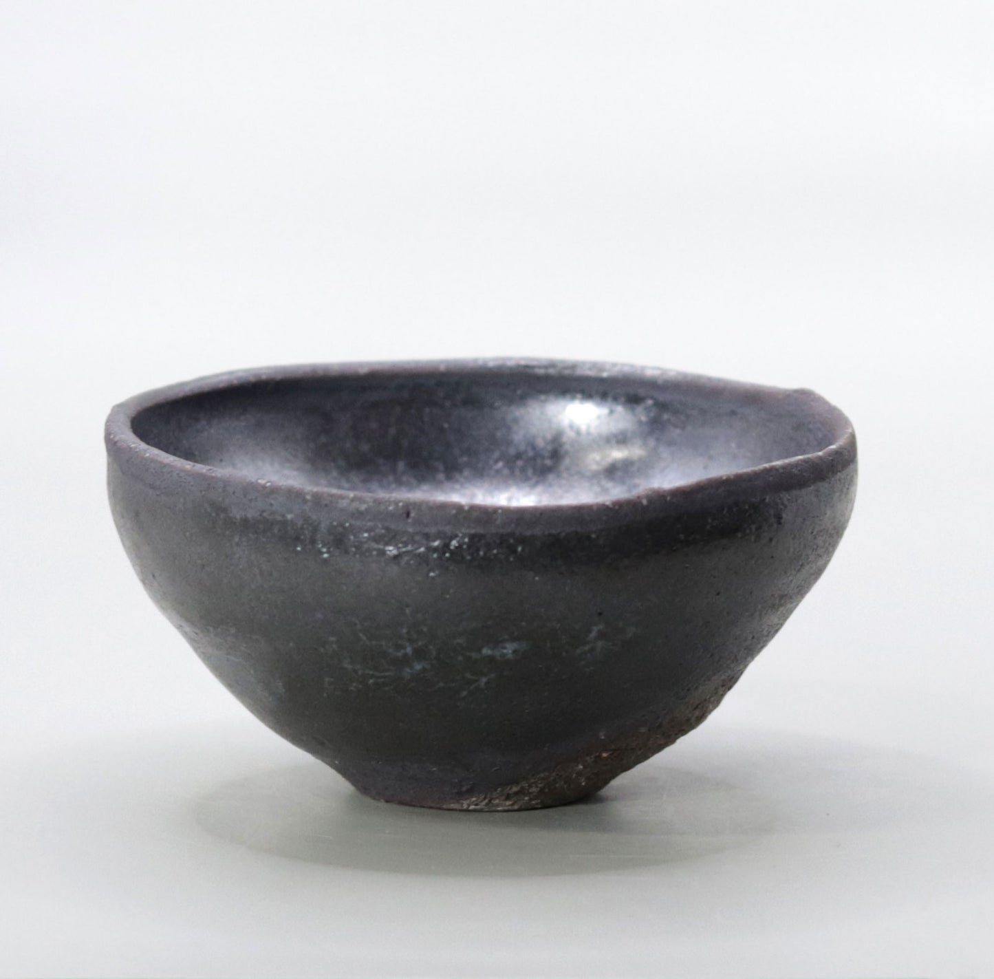 Iron glazed sake cup by Yuichi Ikai