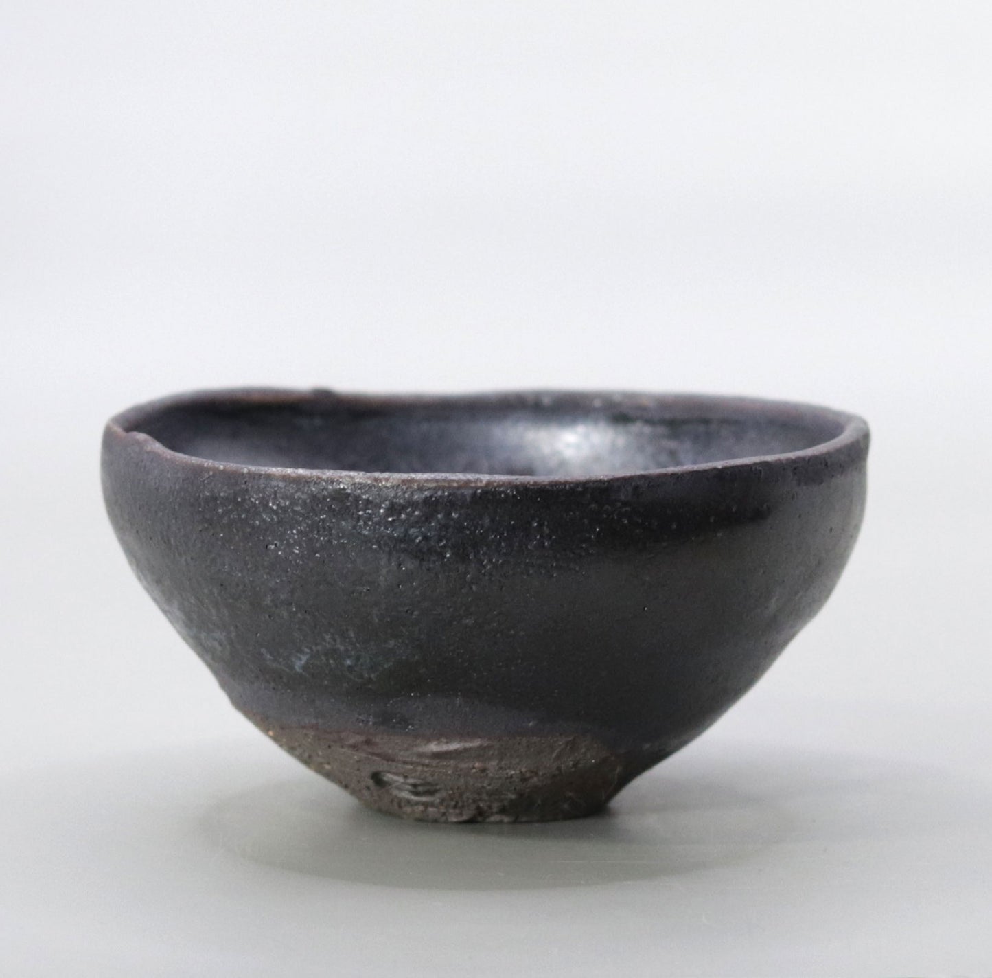 Iron glazed sake cup by Yuichi Ikai