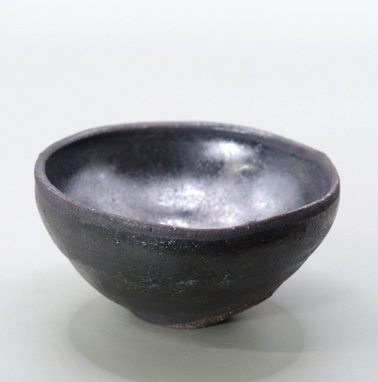 Iron glazed sake cup by Yuichi Ikai