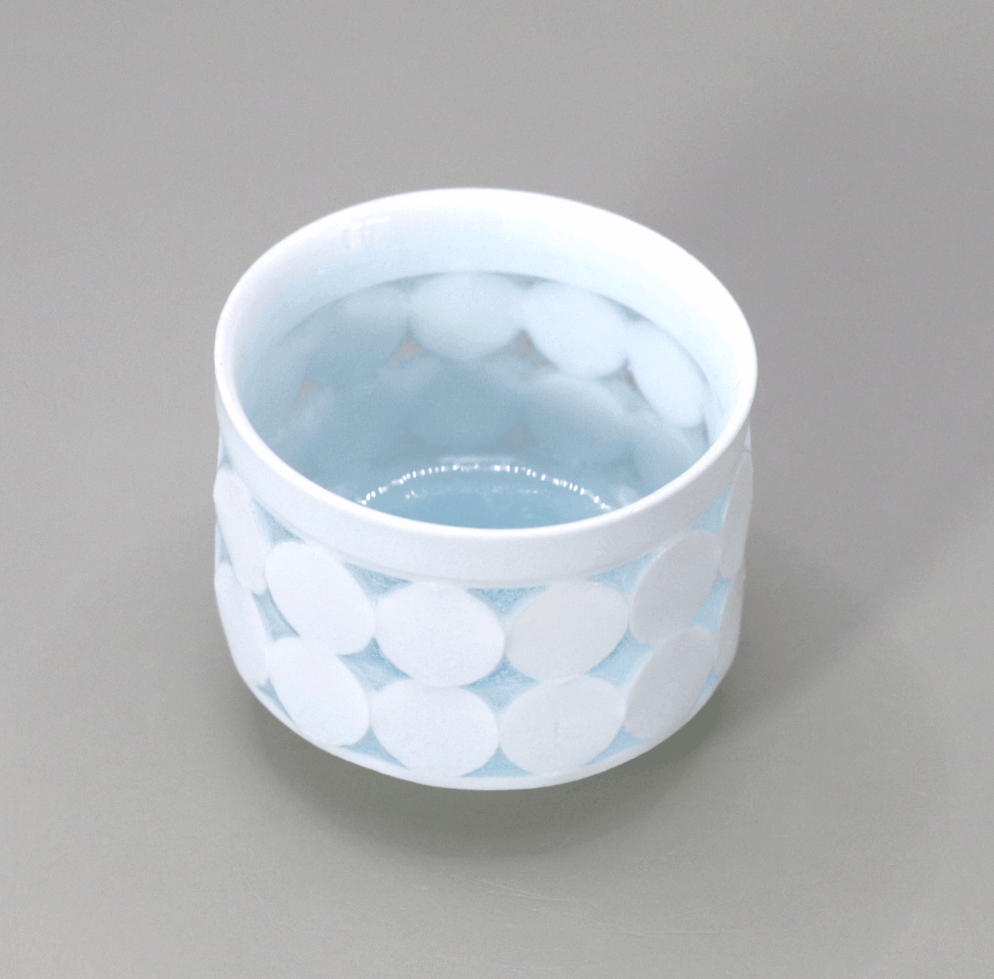 Blue and white porcelain firefly sake cup by Kotaro Ikura