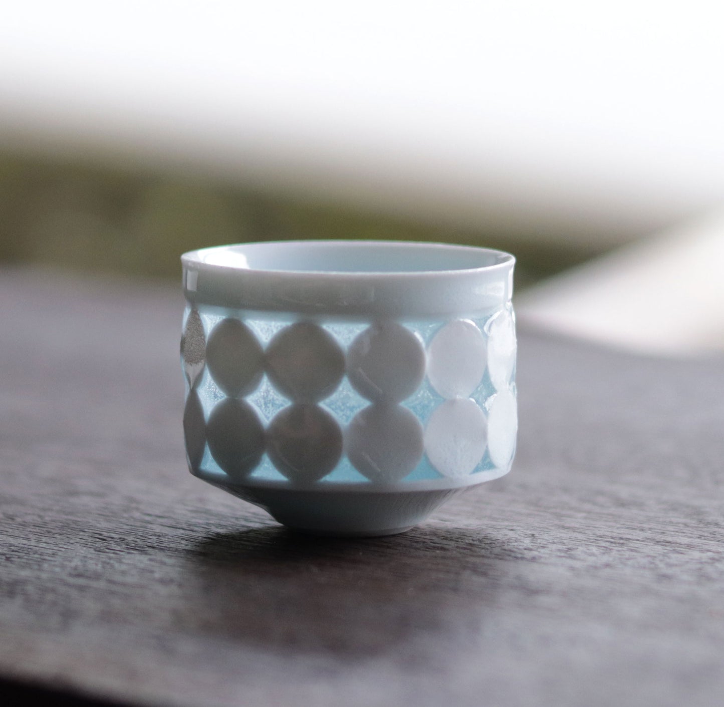 Blue and white porcelain firefly sake cup by Kotaro Ikura