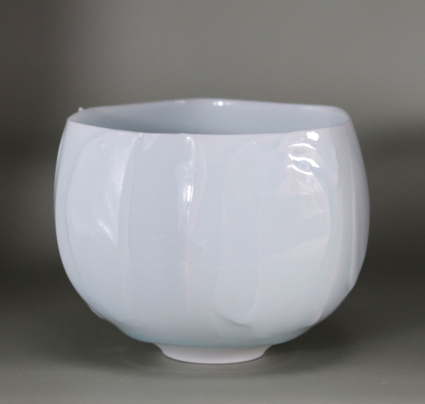 Blue and white chamfered tea bowl by Kotaro Ikura