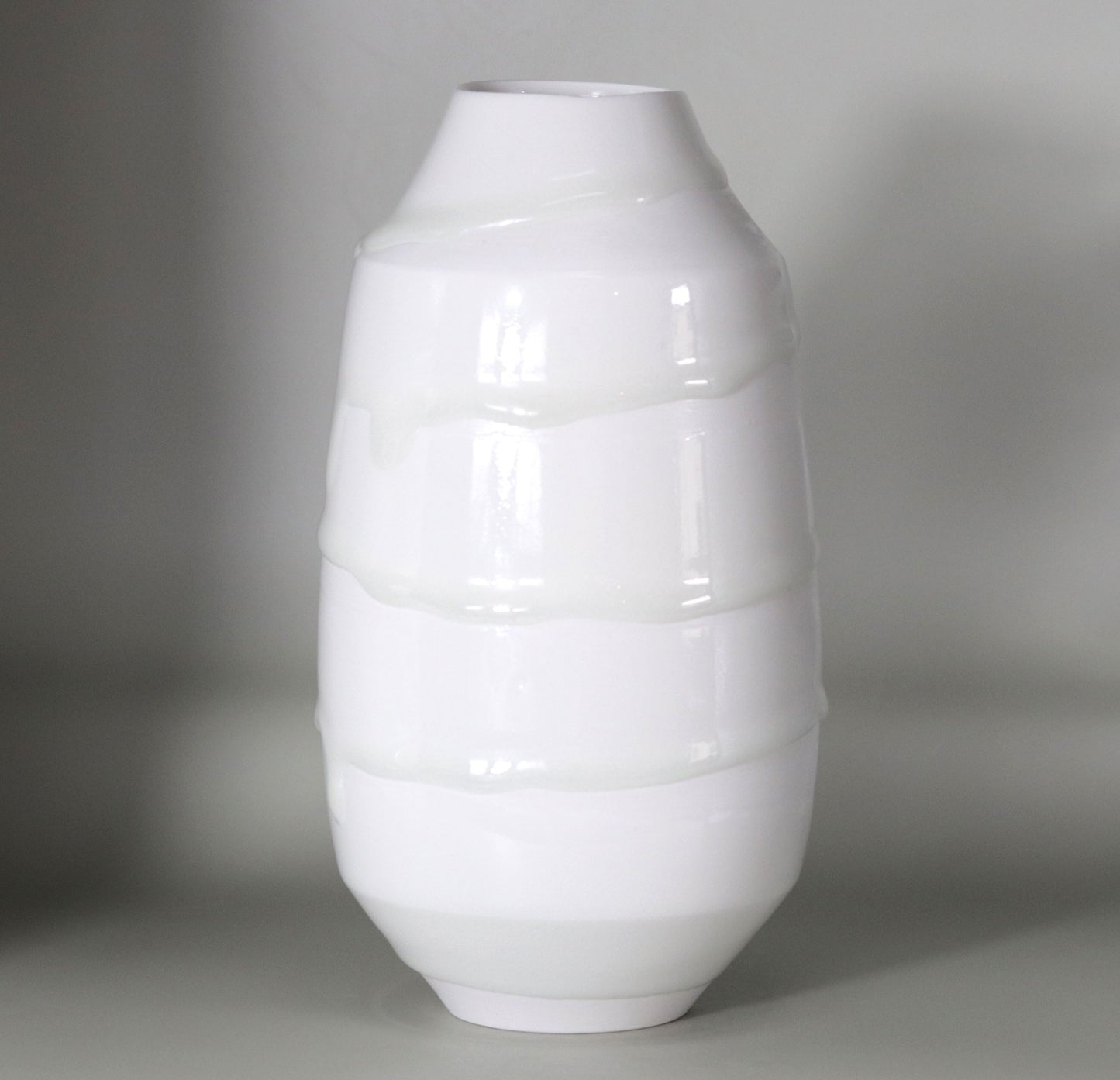 White porcelain vase with hanging ornaments by Kotaro Ikura