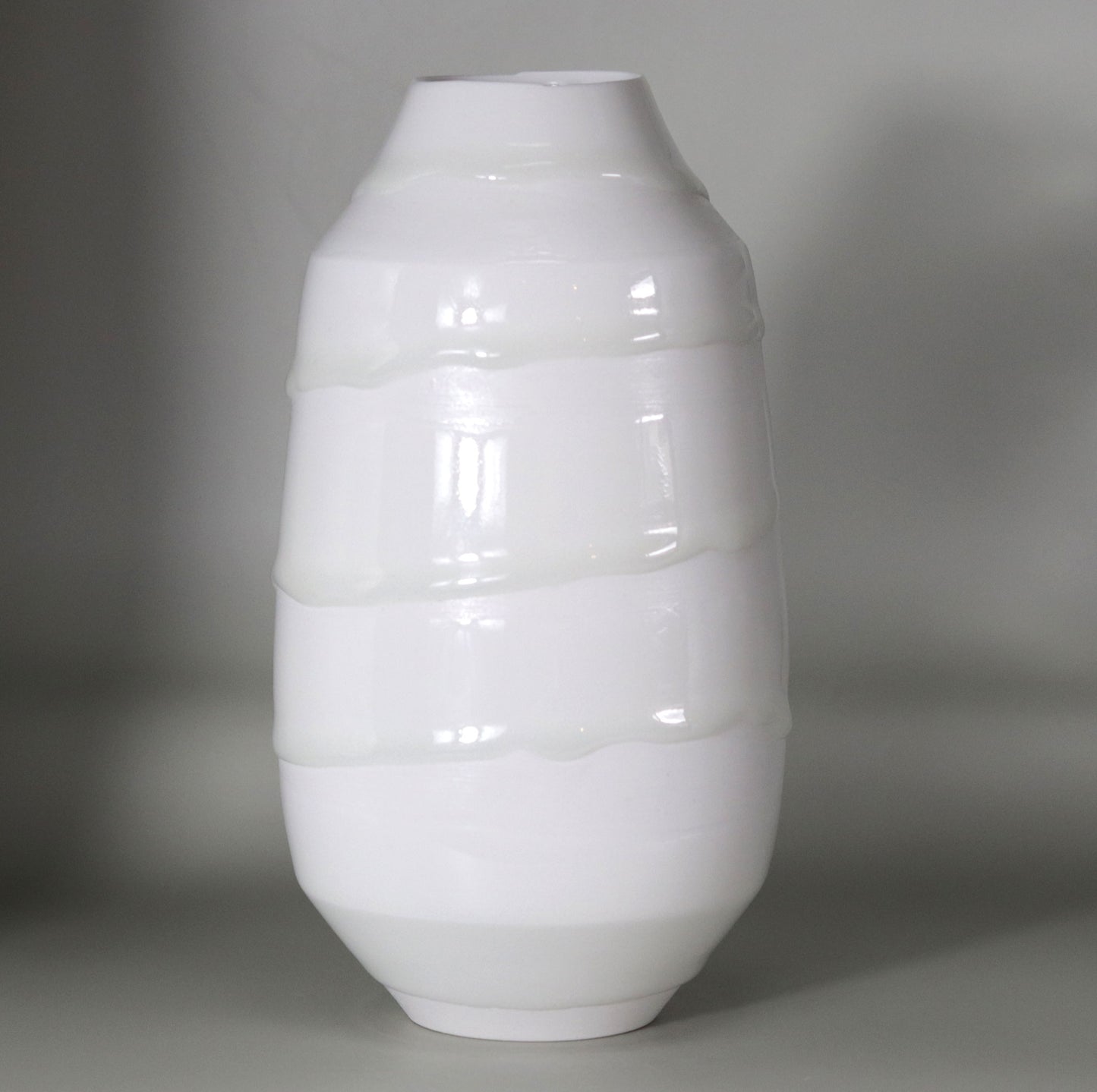 White porcelain vase with hanging ornaments by Kotaro Ikura