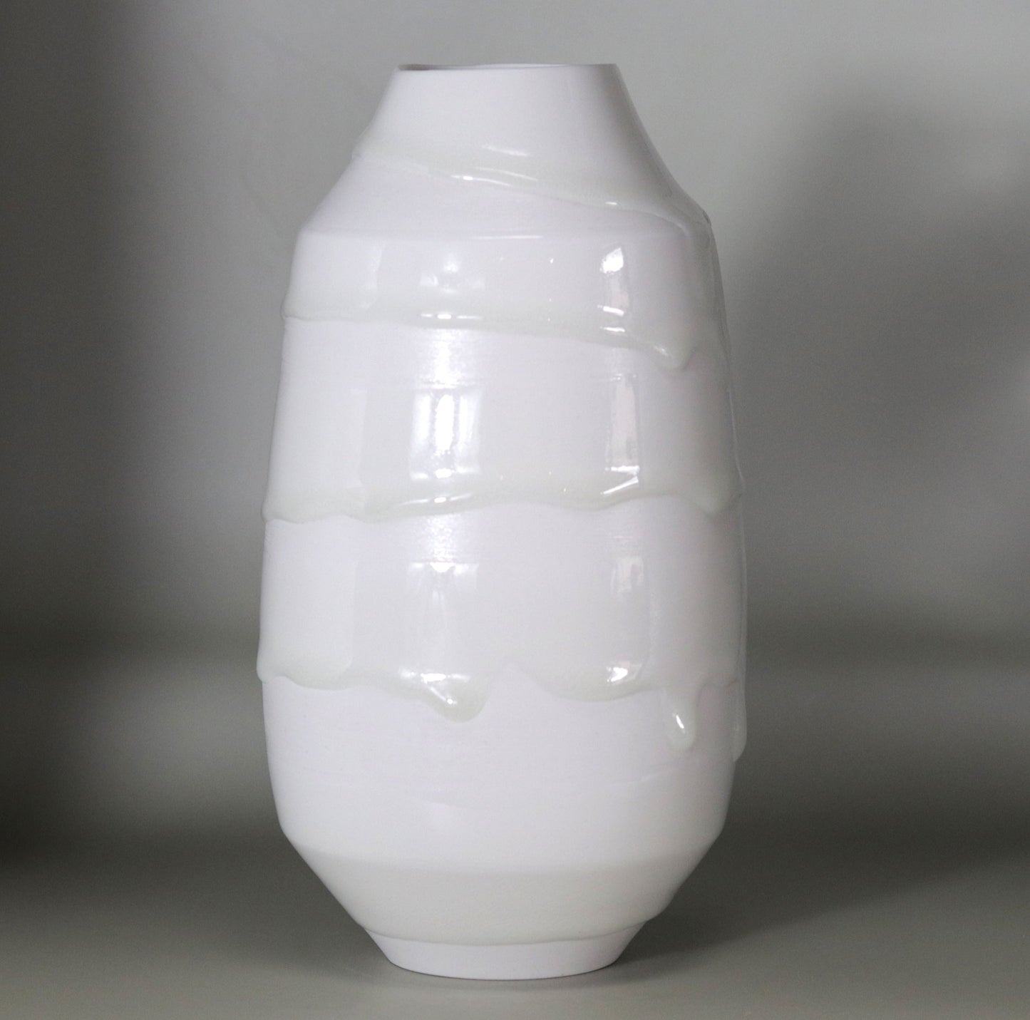 White porcelain vase with hanging ornaments by Kotaro Ikura