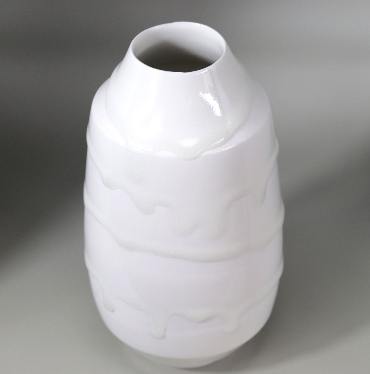 White porcelain vase with hanging ornaments by Kotaro Ikura