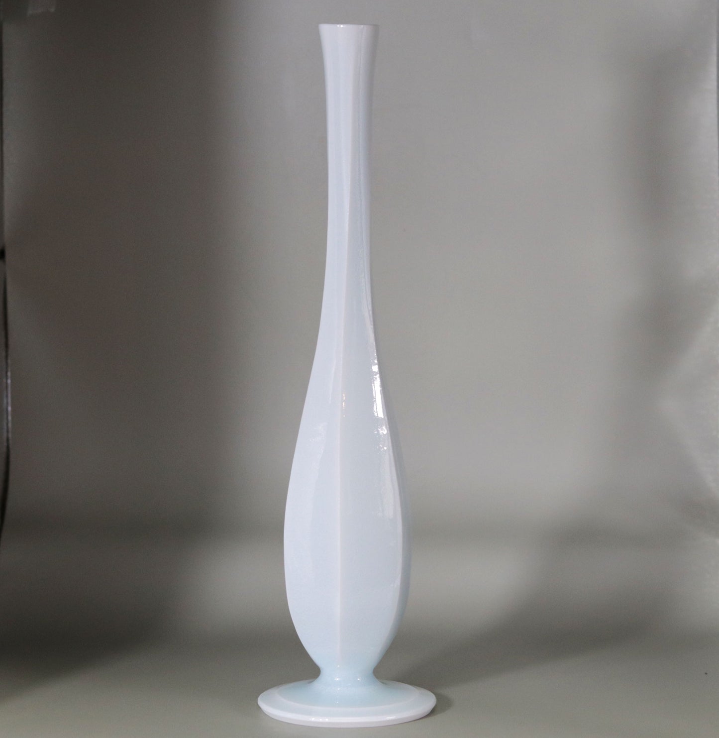 Blue and white porcelain beveled crane-neck vase by Kotaro Ikura