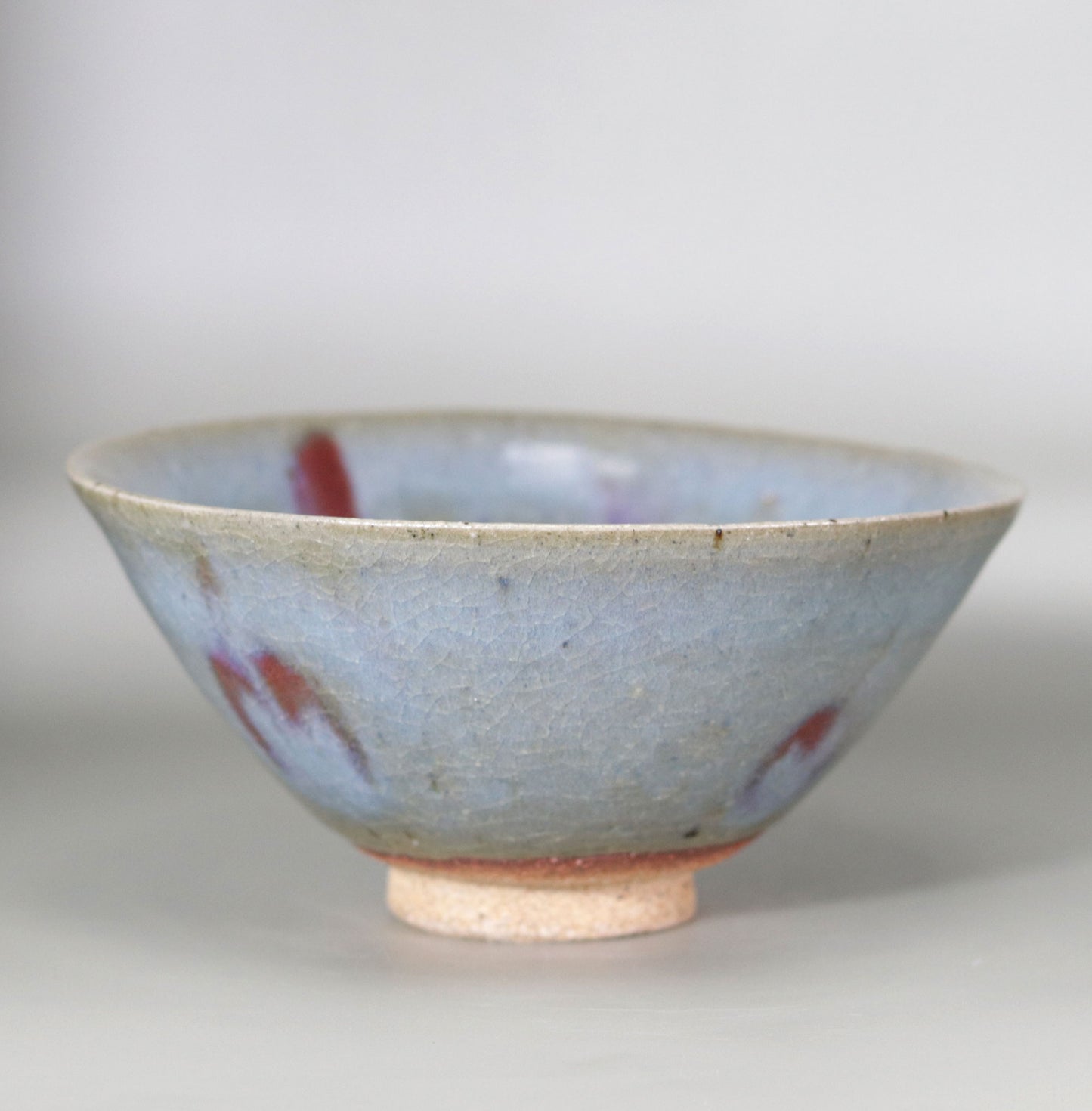 Yagyu ware tea bowl with floral motif by Kotaro Ikura