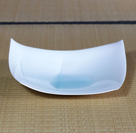 Blue and white magnetic boat vessel by Kotaro Ikura