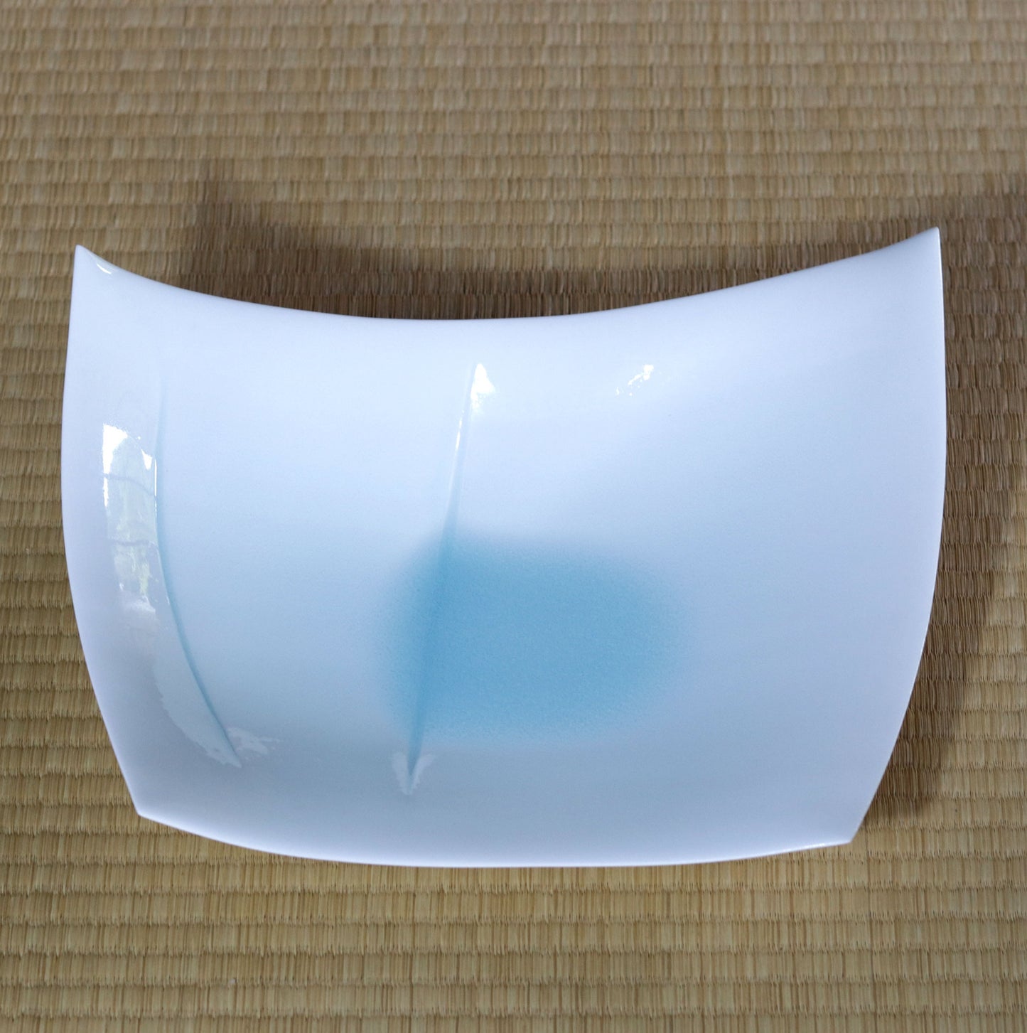 Blue and white magnetic boat vessel by Kotaro Ikura