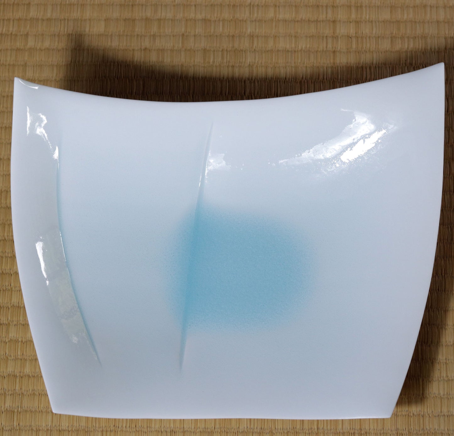 Blue and white magnetic boat vessel by Kotaro Ikura