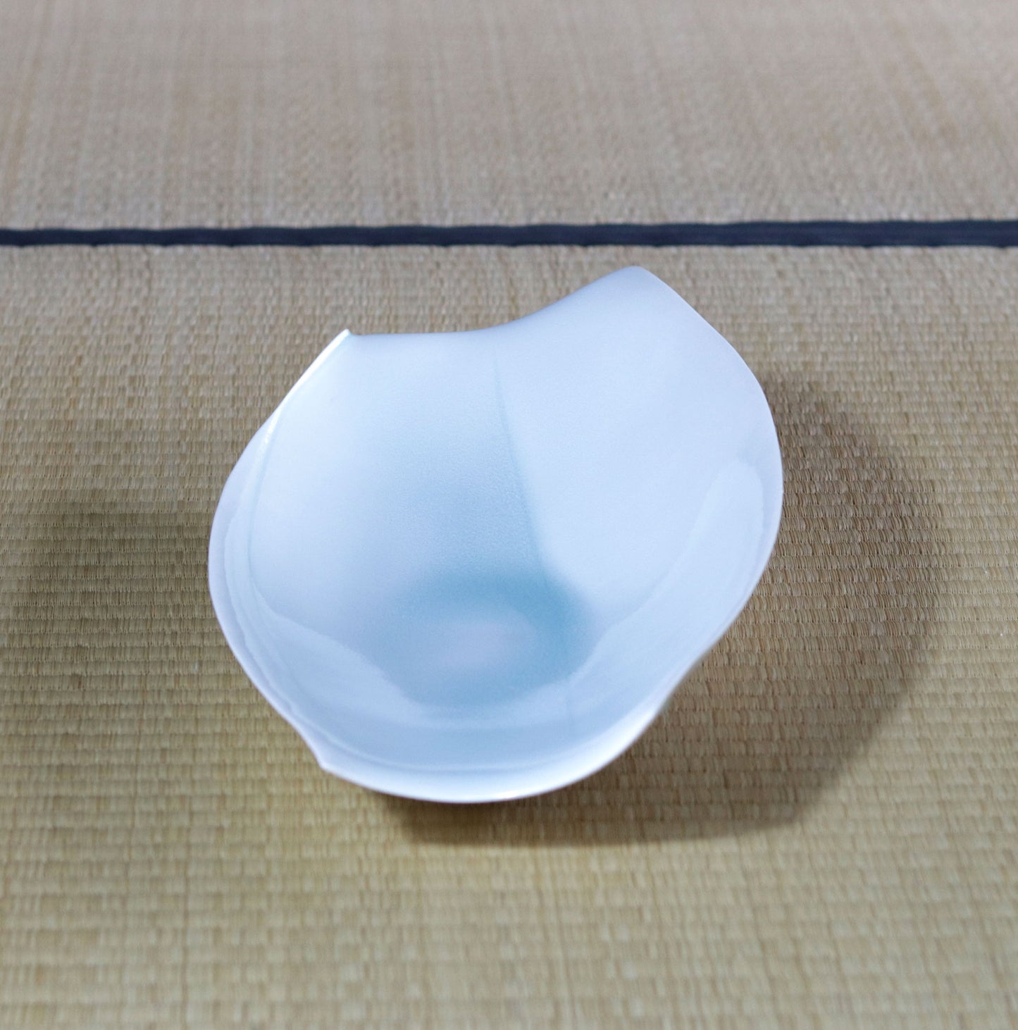 Blue and white magnetic boat vessel by Kotaro Ikura