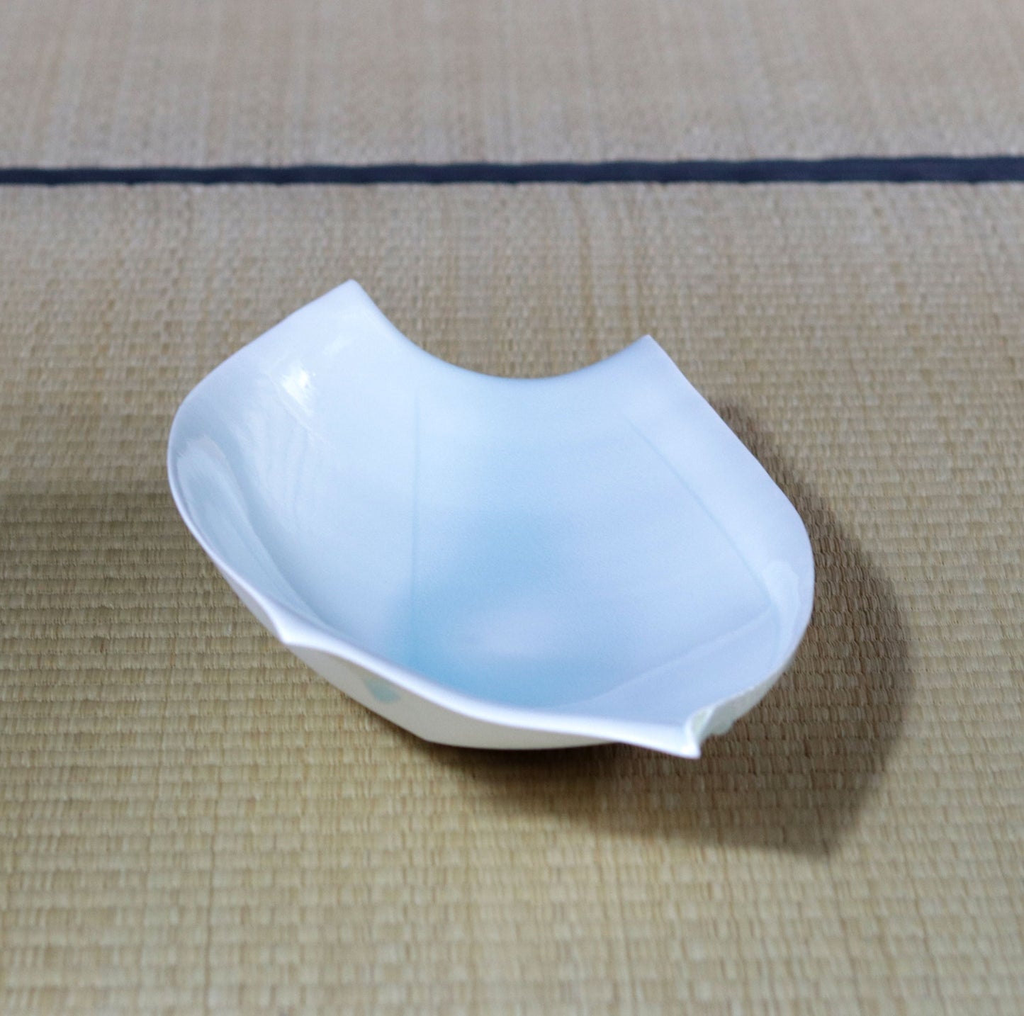 Blue and white magnetic boat vessel by Kotaro Ikura