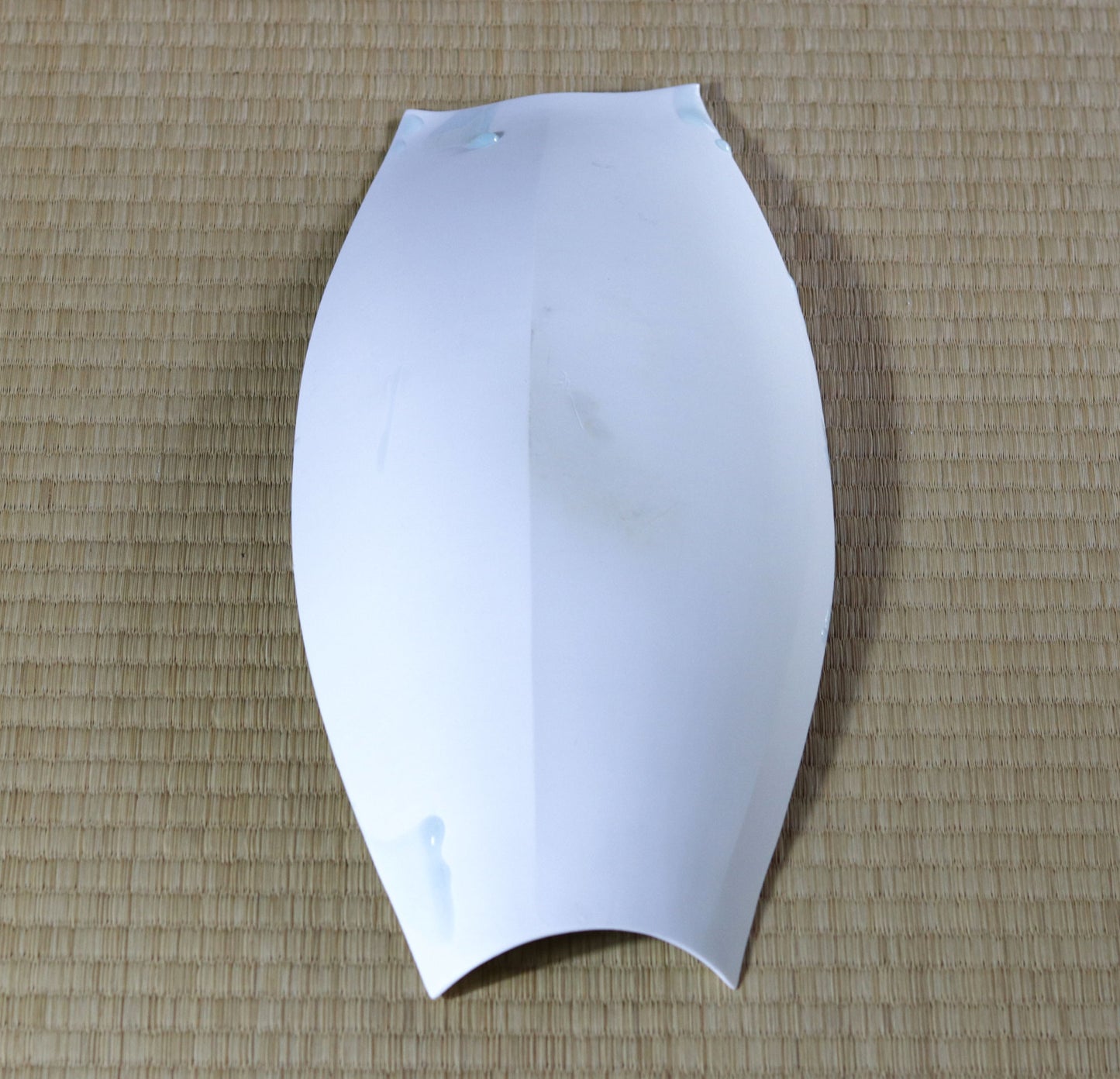 Blue and white magnetic boat vessel by Kotaro Ikura