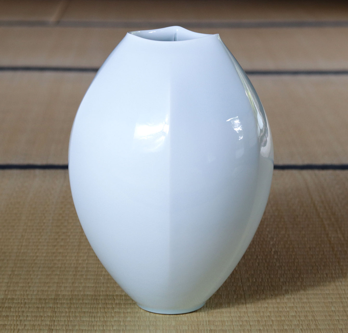 Blue and white porcelain chamfered vase by Kotaro Ikura