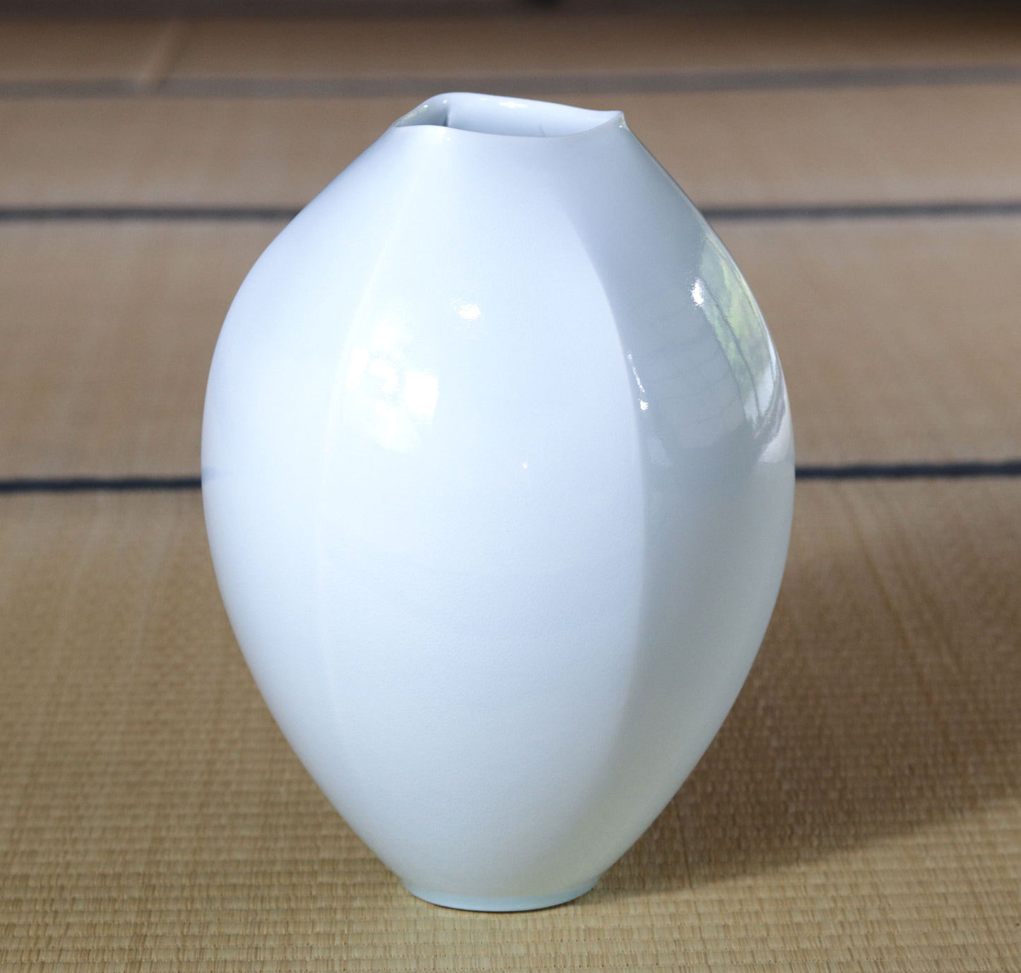 Blue and white porcelain chamfered vase by Kotaro Ikura