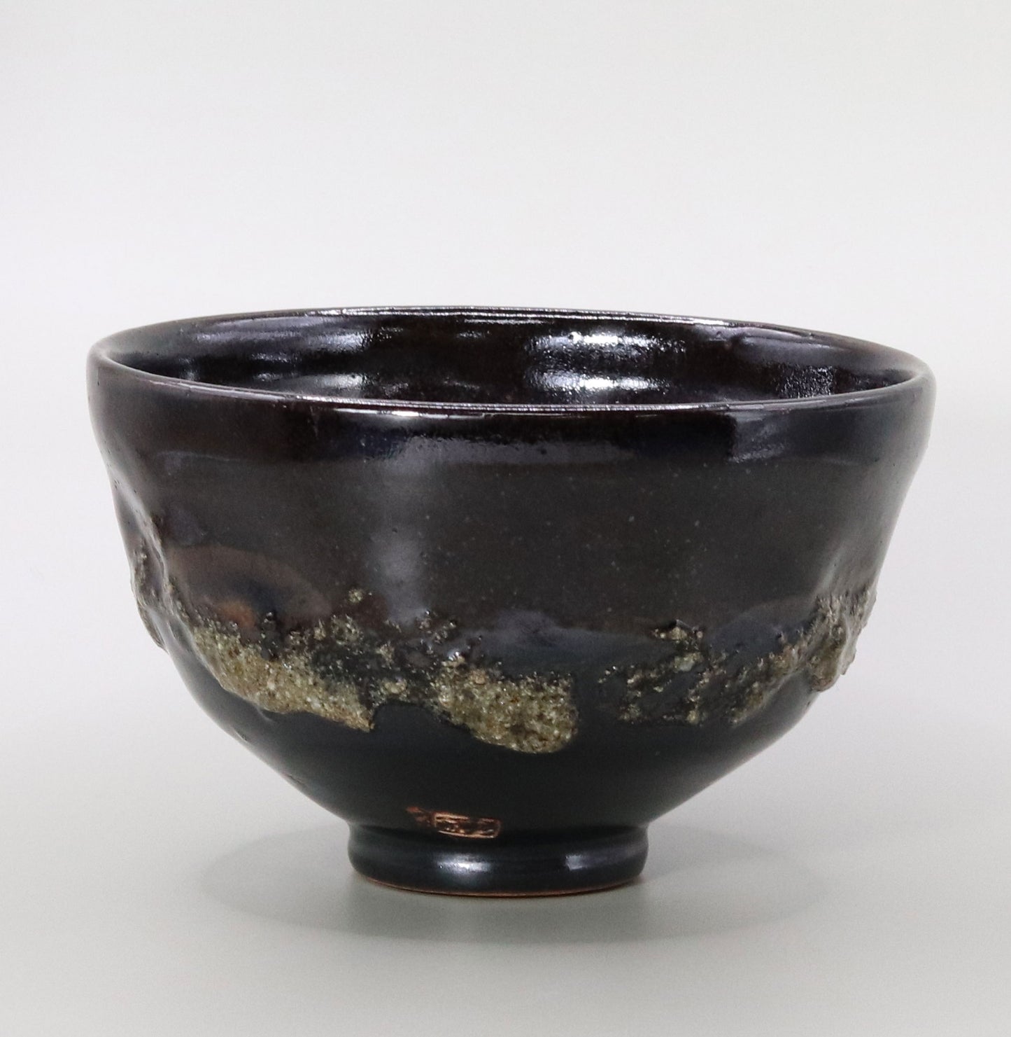 Tanba black tea bowl by Naosaku