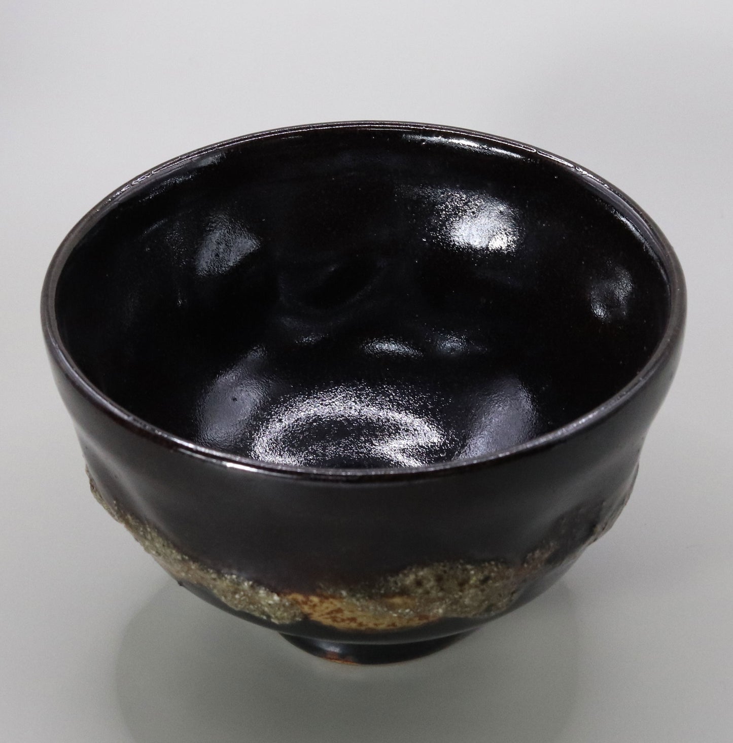 Tanba black tea bowl by Naosaku