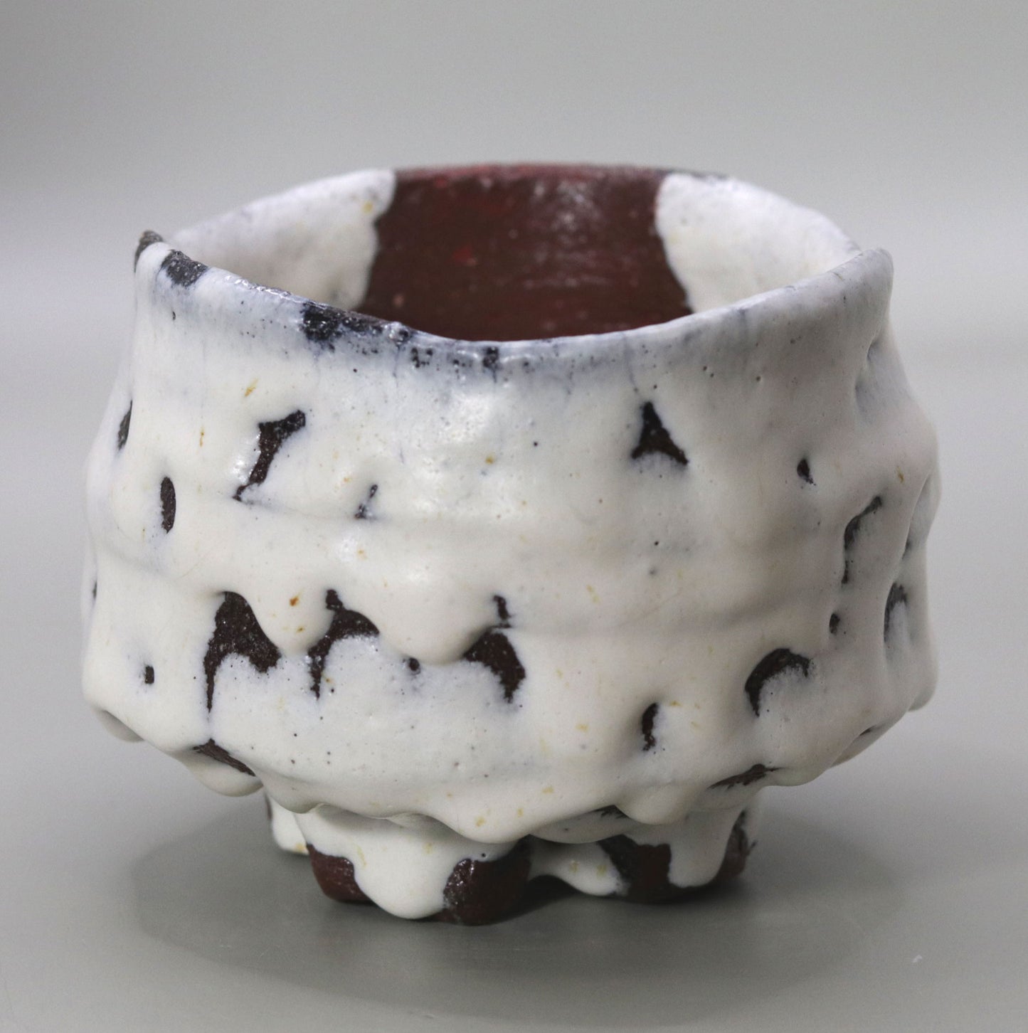 Porcelain tea bowl with a milky glaze by Nishihata Tadashi