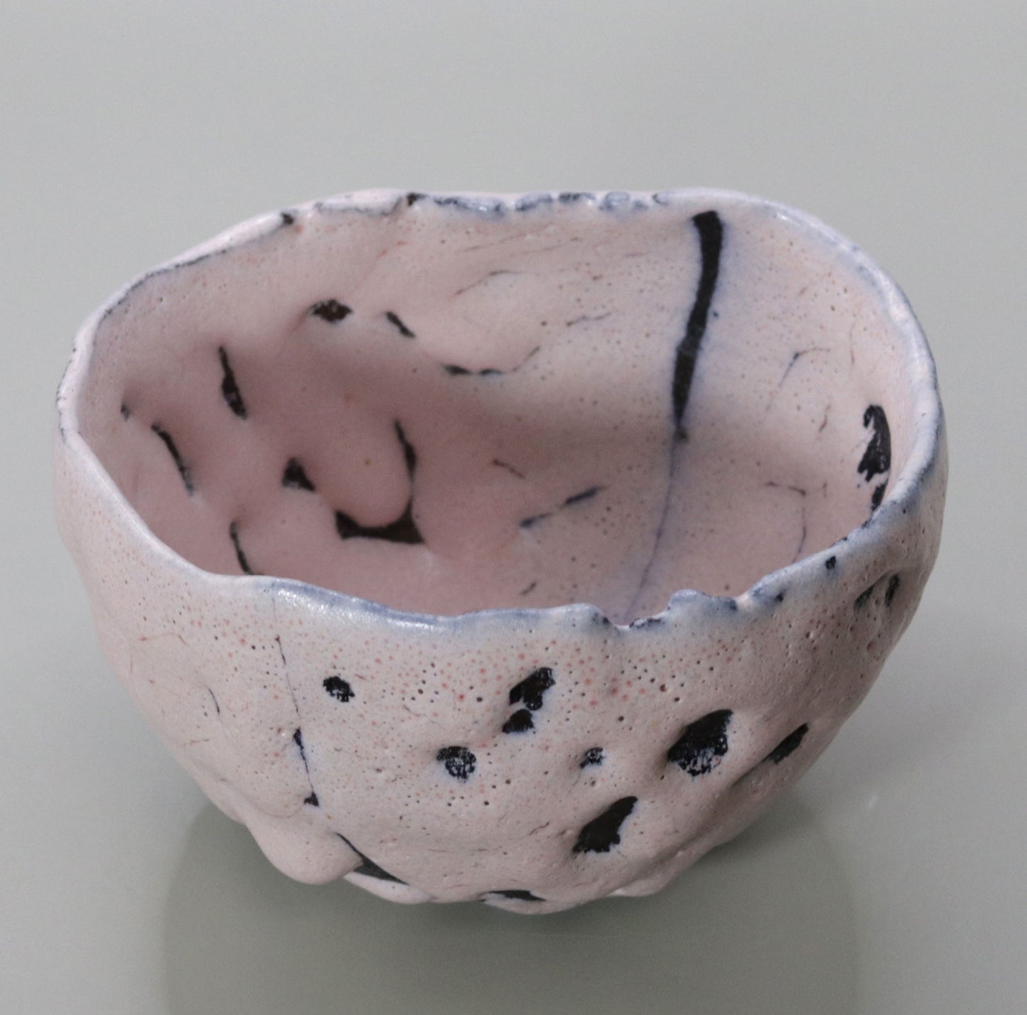 Pink tea bowl by Nishihata Tadashi