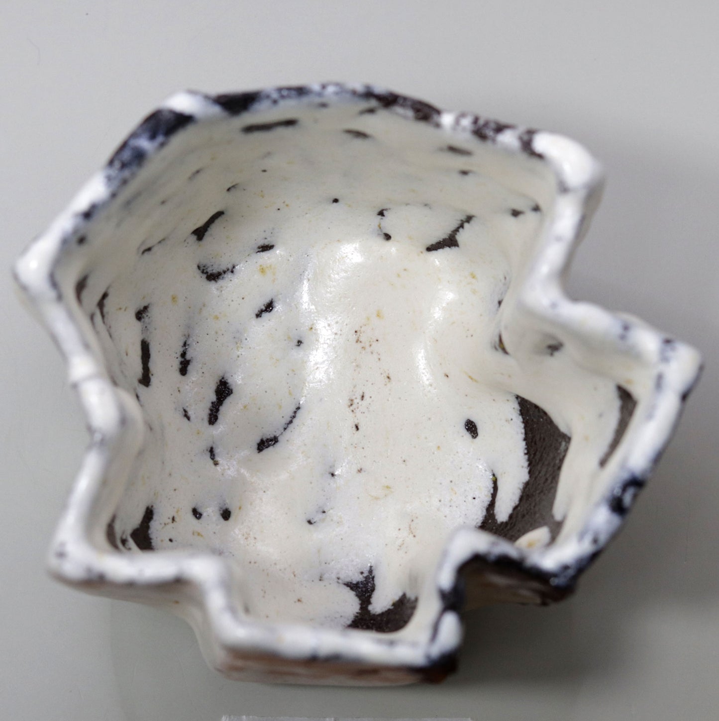 Tea bowl with a soft, milky hue by Nishihata Tadashi