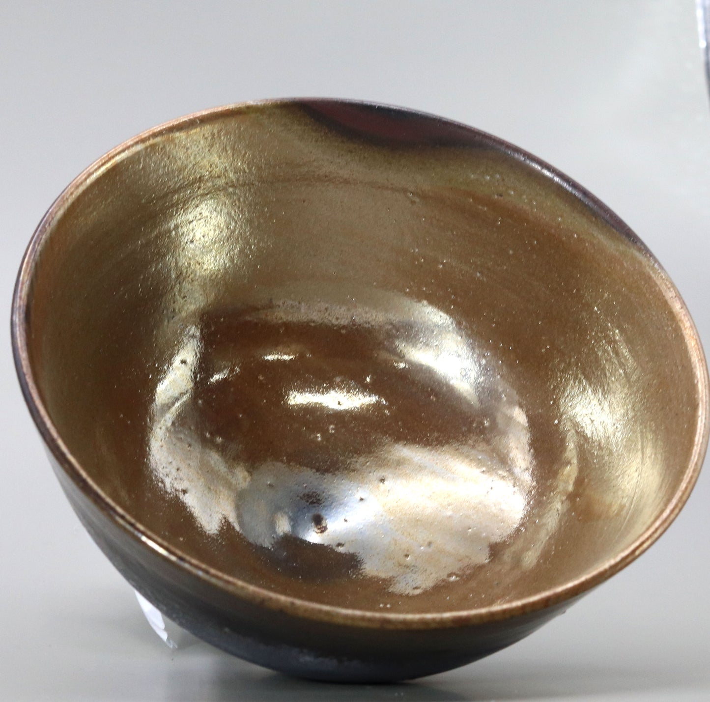 Tanba gold leaf kiln-changed tea bowl by Naosaku