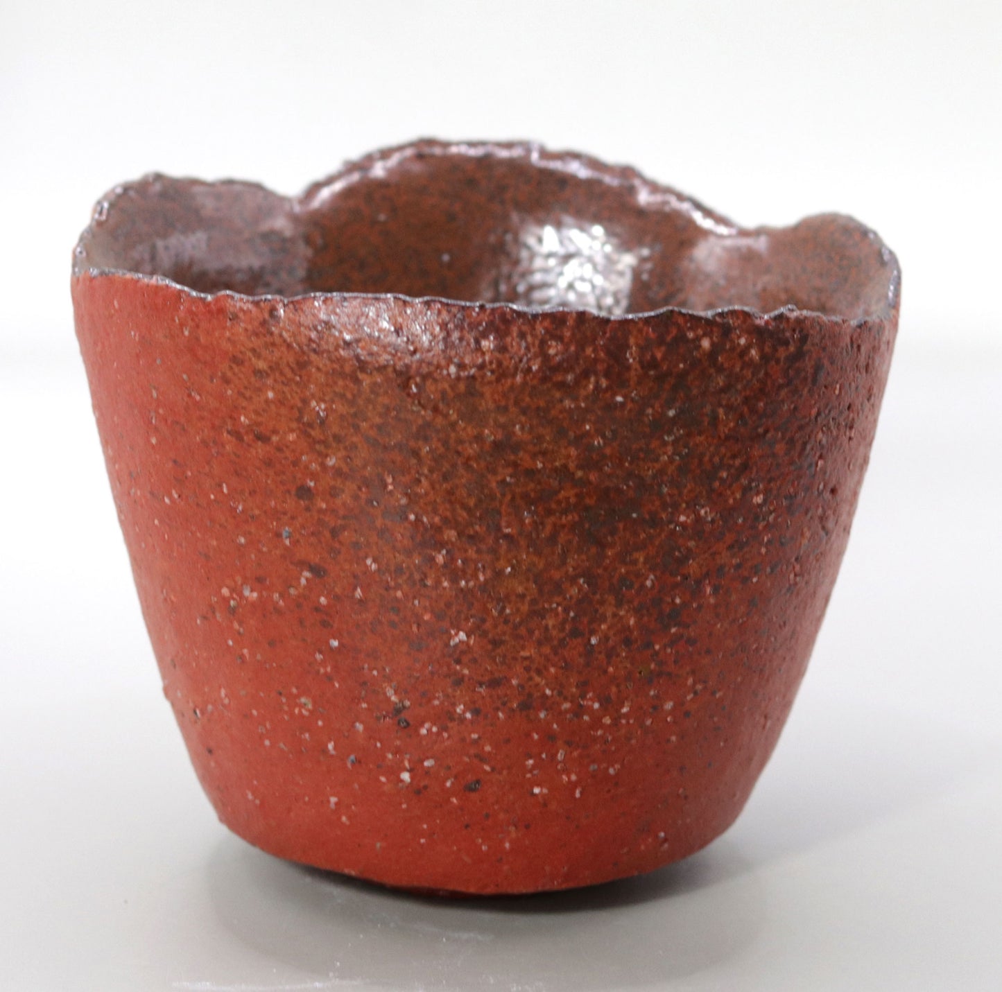 Powerful presence Red Concave Tea Bowl by Nishihata Tadashi